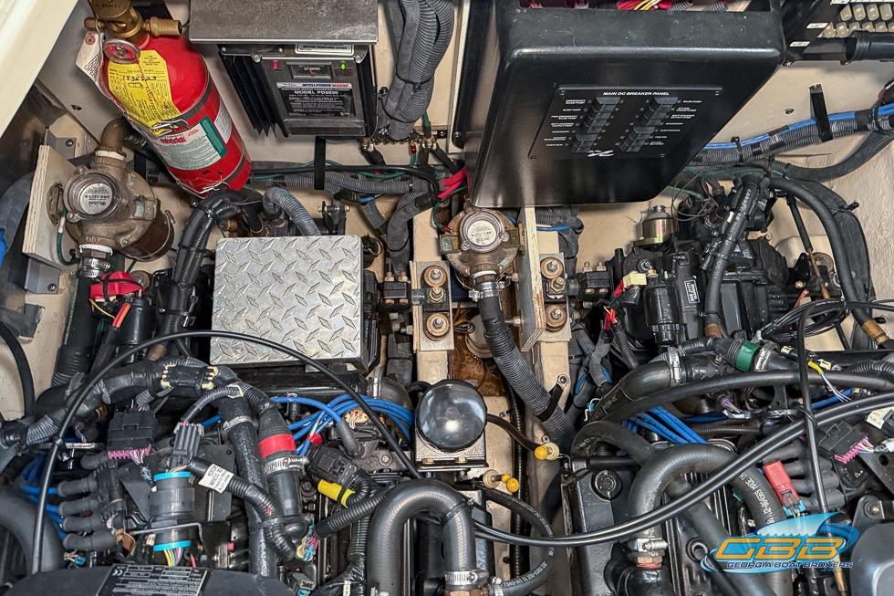 Engine compartment of a 2007 Sea Ray Sundancer 320 with wiring and components visible.