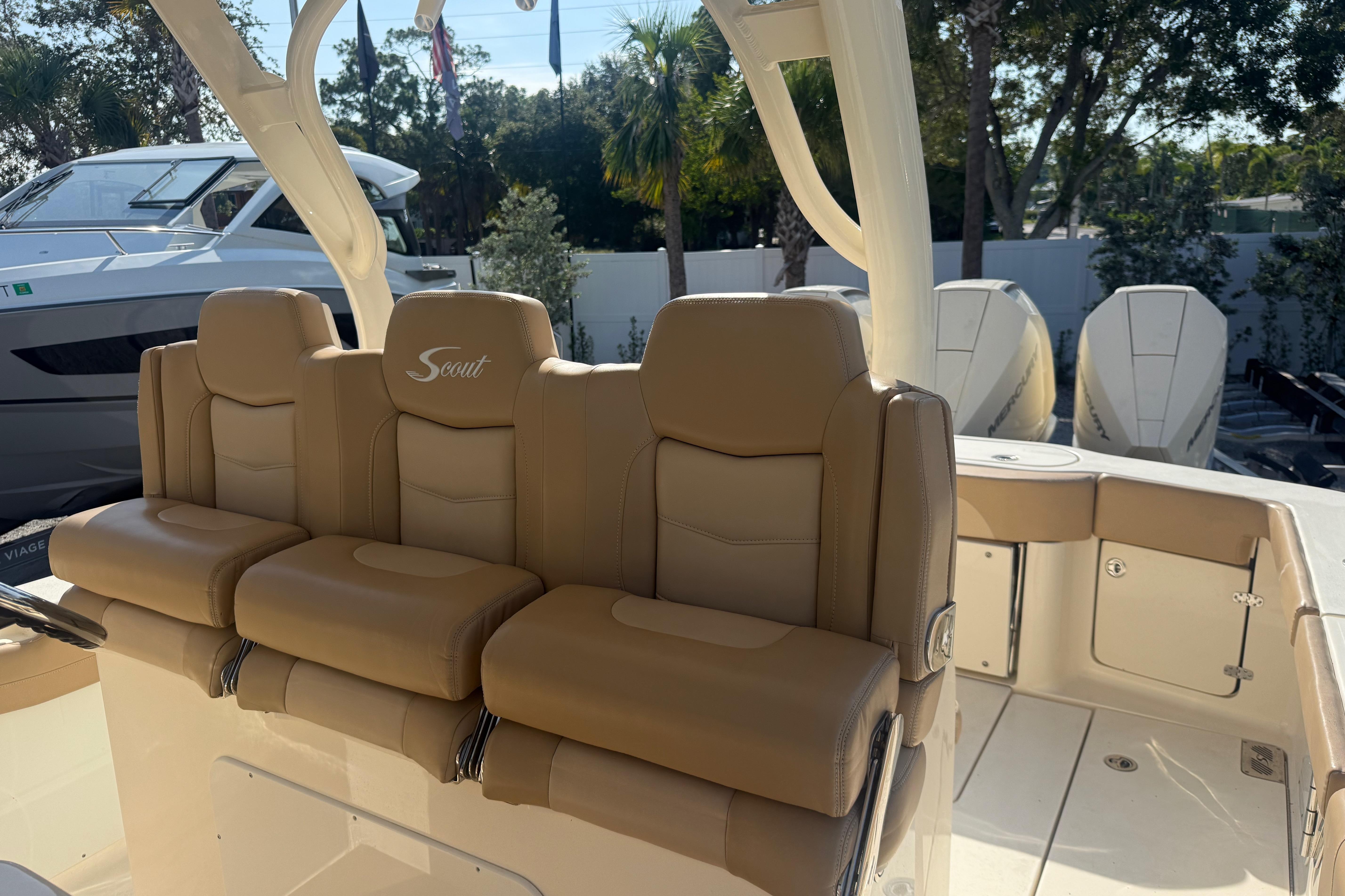 2022 Scout 355 LXF boat with tan leather seating and modern design.