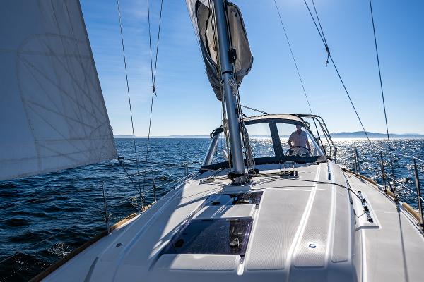 Beneteau Oceanis 38.1 sailboat, 2021, on open sea.