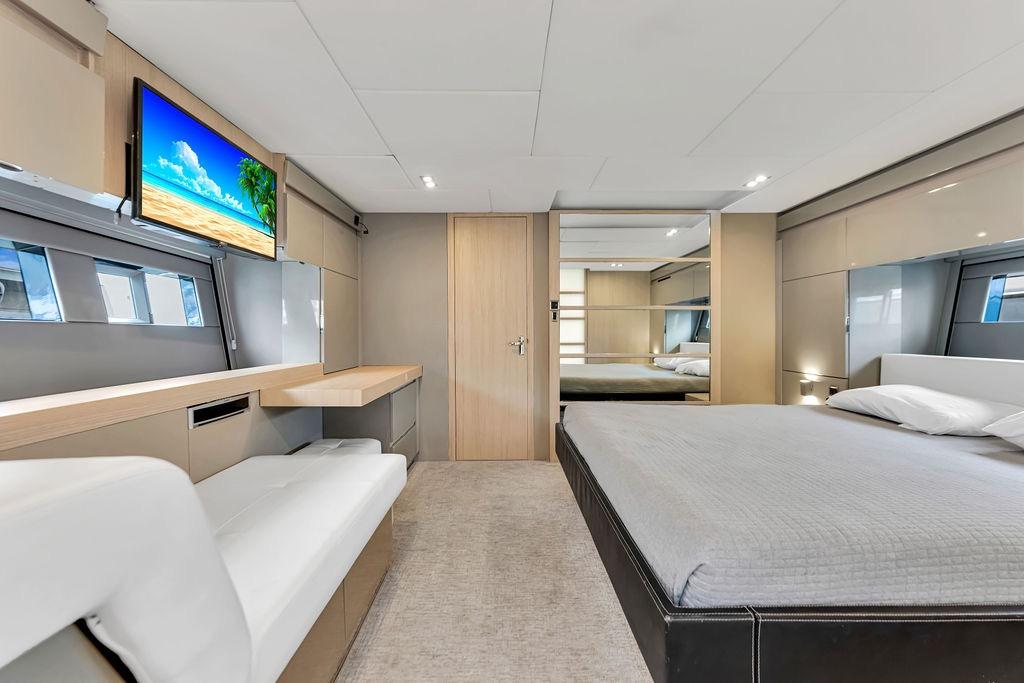 Luxurious interior of 2012 Fairline Targa 58 yacht with modern bedroom design.