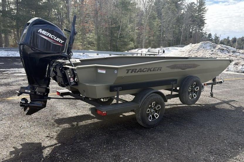 2026 Tracker Grizzly 1650 T Prairie Wings Edition boat with Mercury engine on trailer.