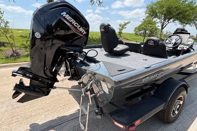 2026 Ranger RT188 boat with Mercury engine on trailer, parked outdoors.