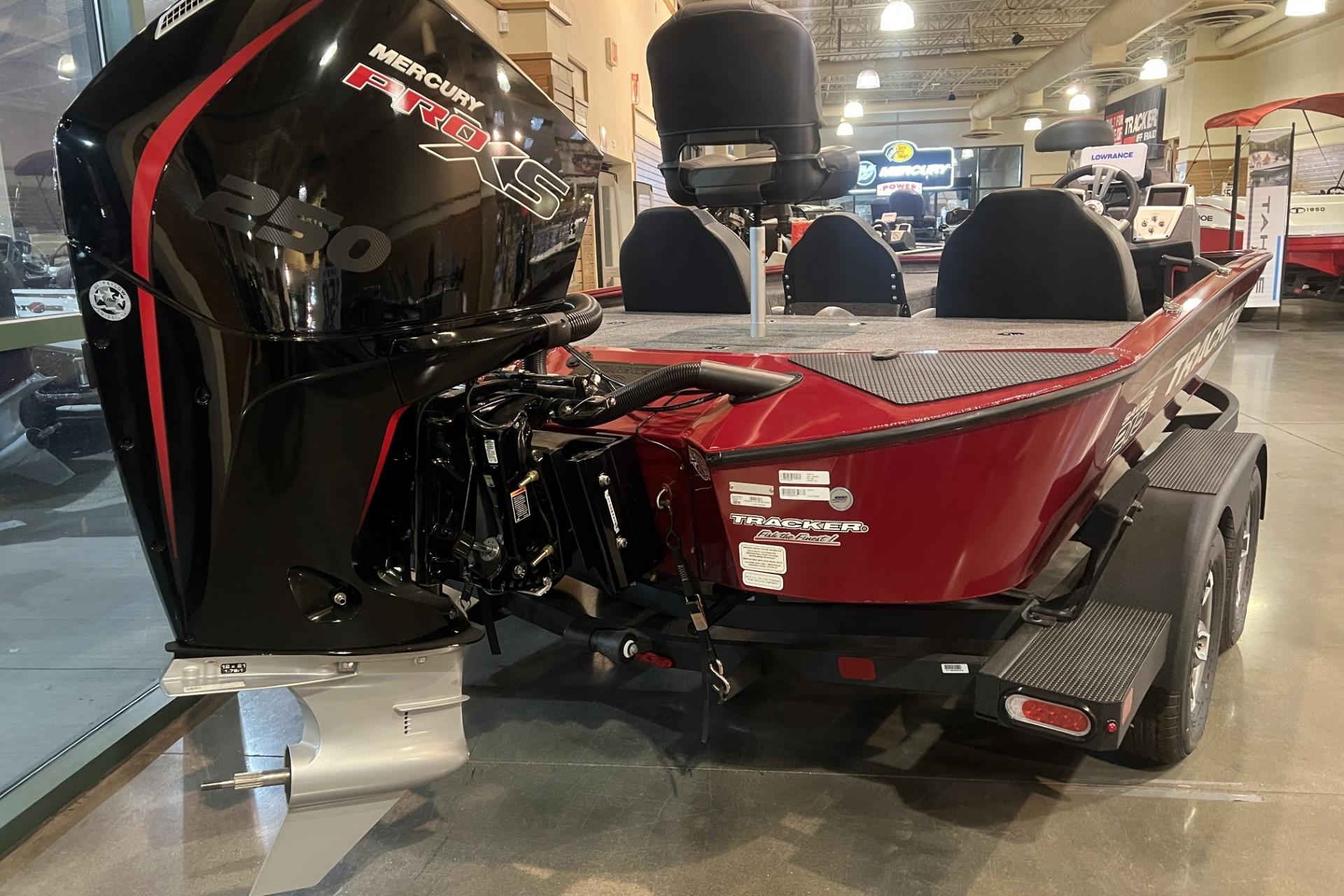2025 Tracker Savage 215 boat with Mercury Pro XS 250 engine in showroom.