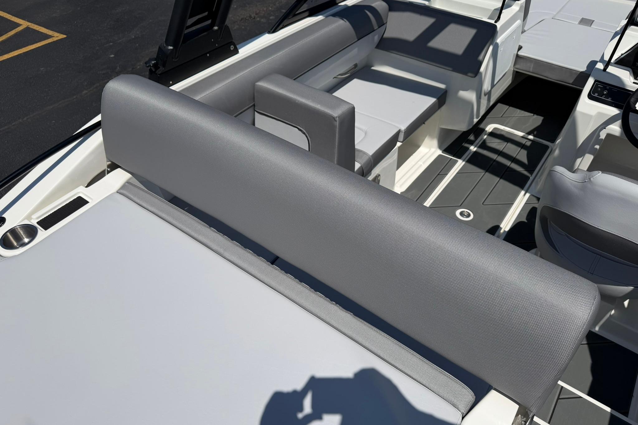 2026 Bayliner D20 boat interior with sleek gray seating and modern design.