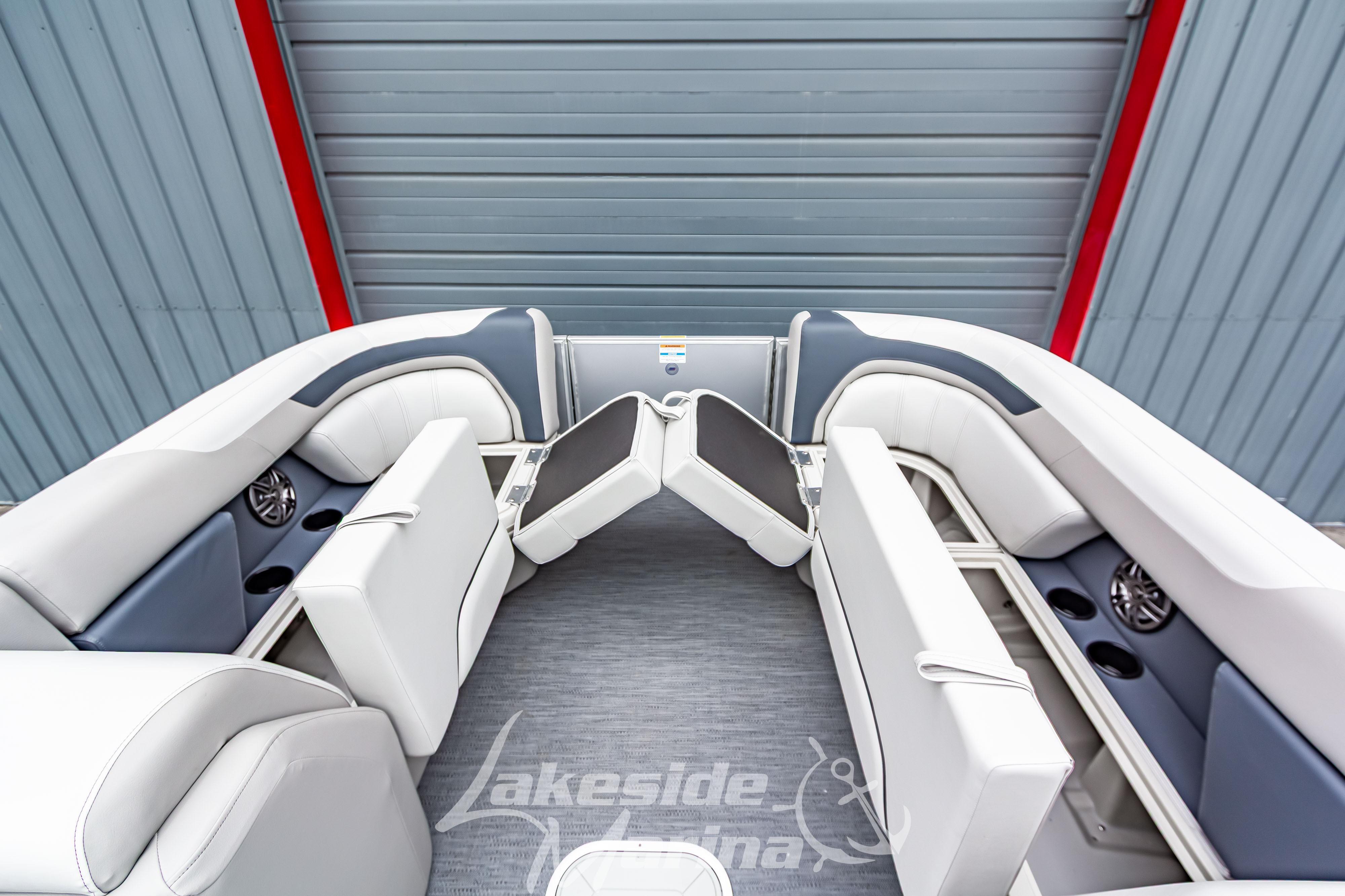 Interior of 2026 Godfrey Sweetwater 2286 SFLC pontoon boat with plush seating.
