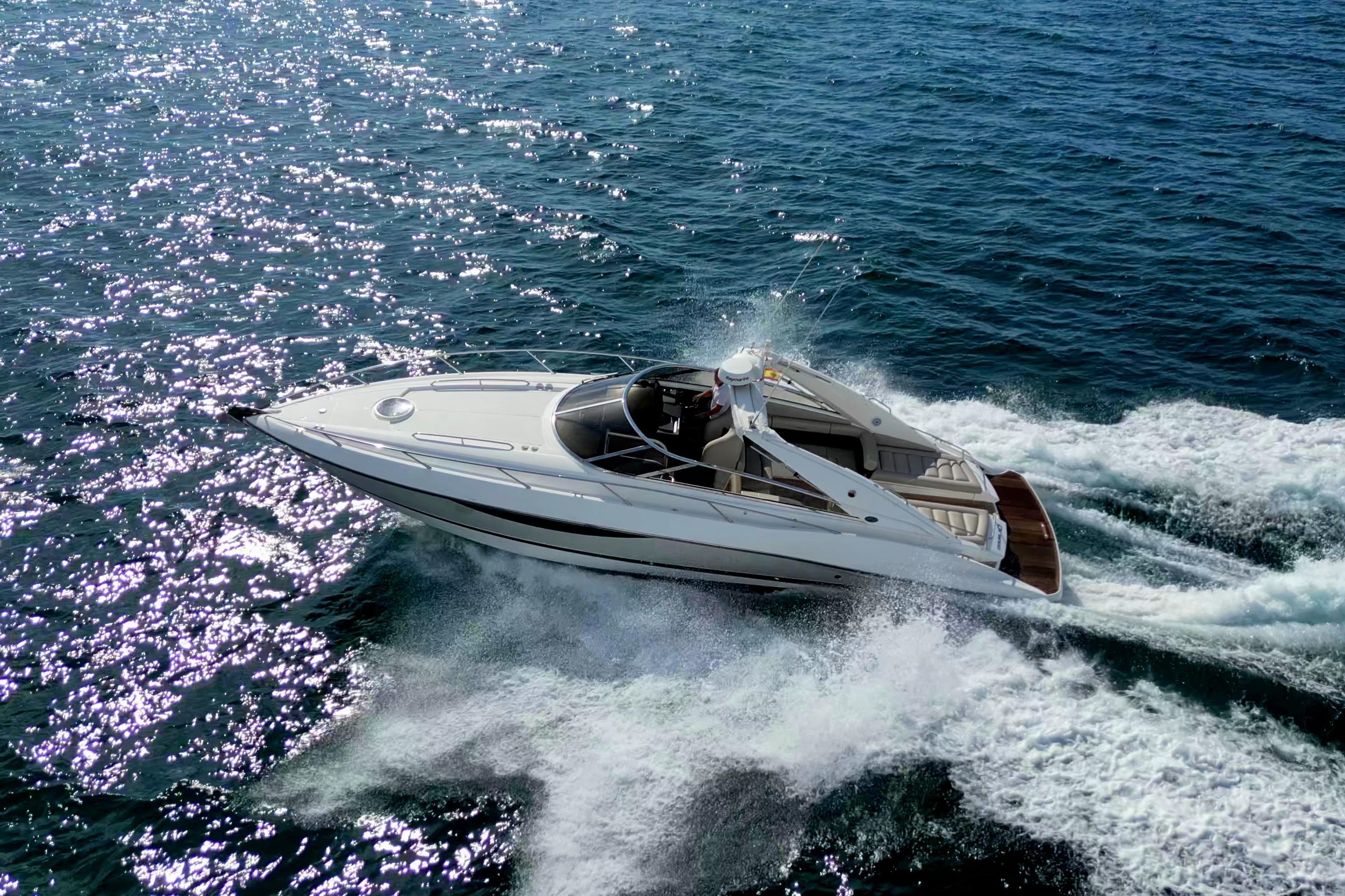 2007 Sunseeker Superhawk 43 cruising on sparkling blue ocean waters.