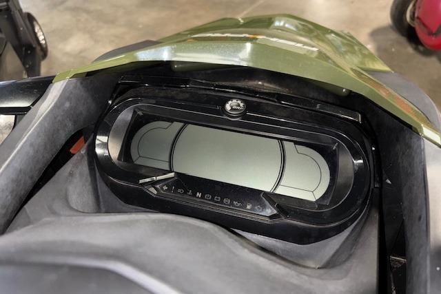 2020 Sea-Doo FISH PRO dashboard with digital display in a garage setting.
