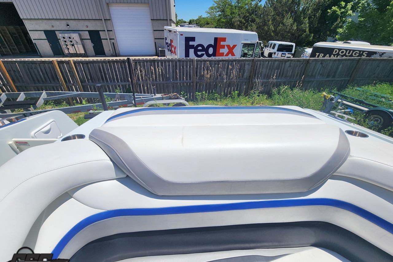 2008 Baja 335 Performance boat interior with FedEx truck in background.