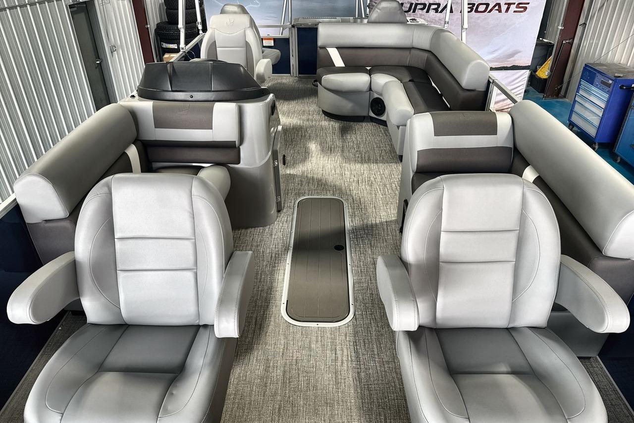 Luxurious interior of 2026 Landau Island Breeze 23F pontoon boat with plush seating.
