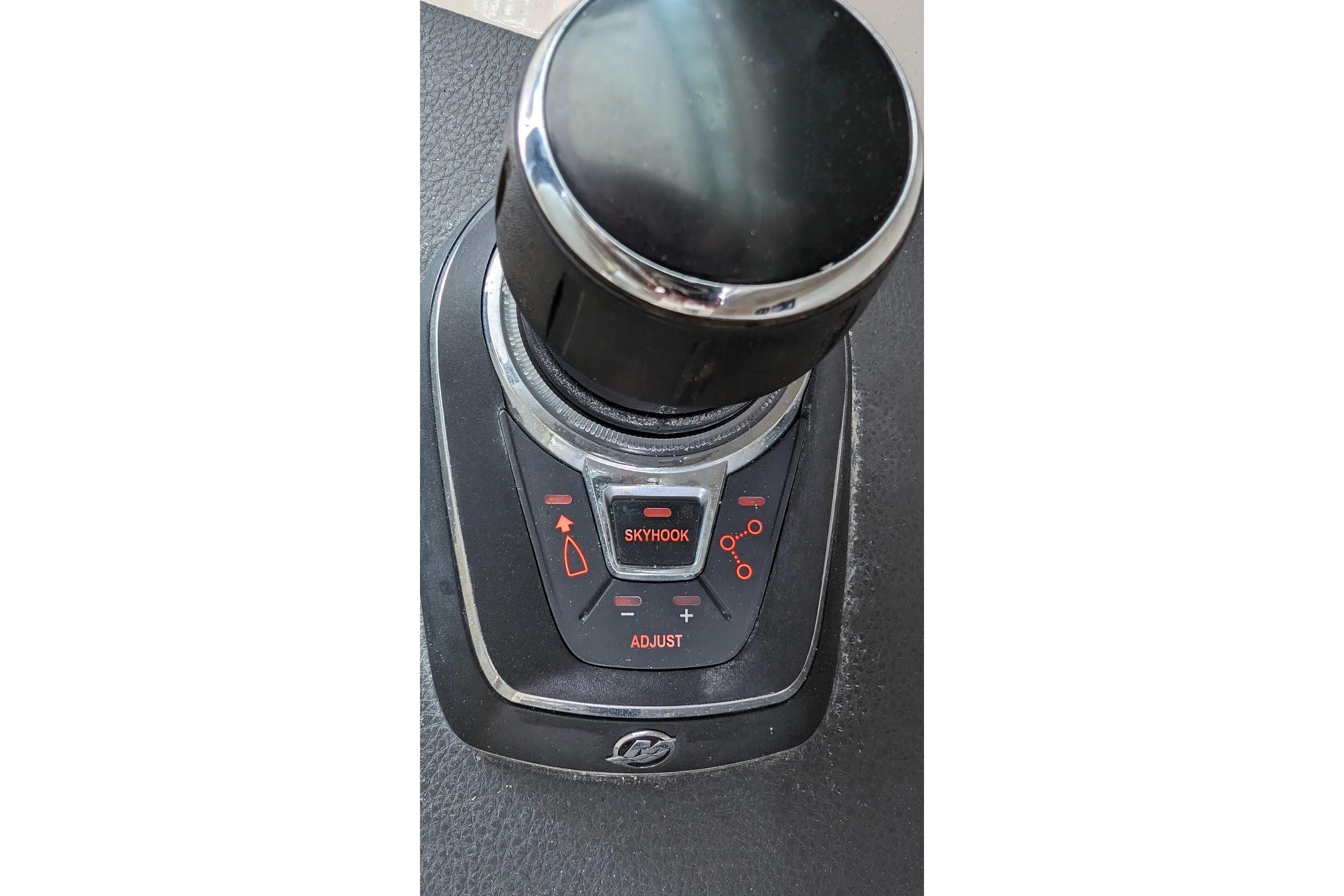 Control panel of a 2017 Boston Whaler 320 Vantage boat featuring Skyhook technology.