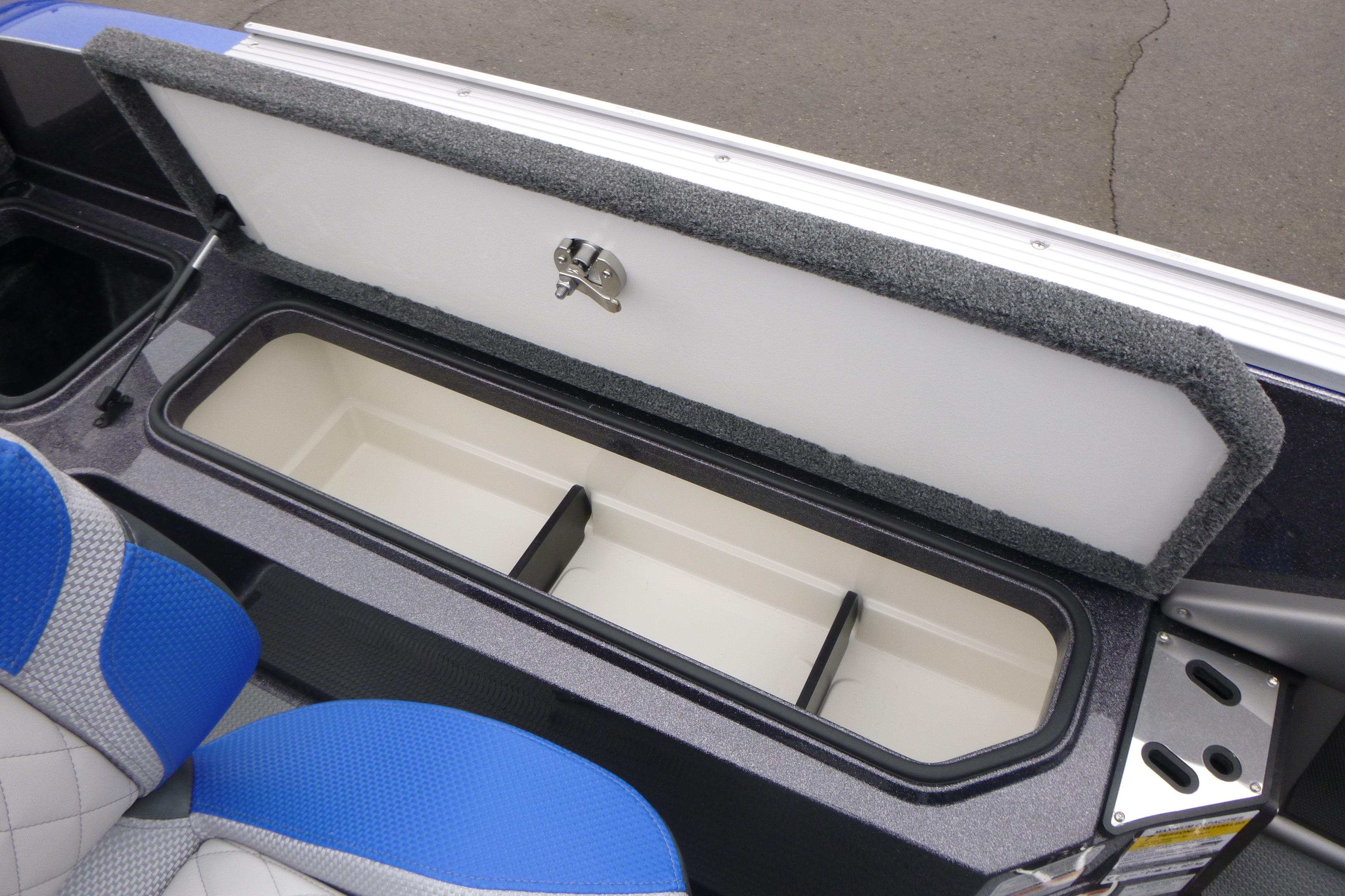 2026 Ranger 620FS Cup Equipped boat storage compartment with open lid and blue seating.