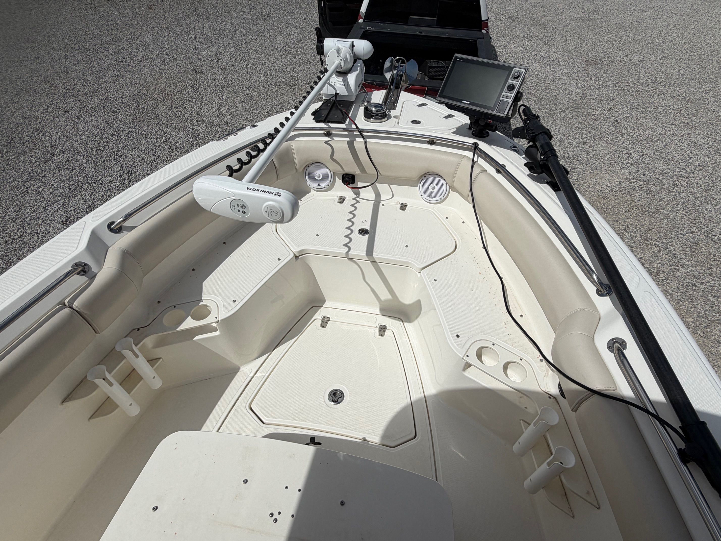 Boston Whaler 230 Outrage 2020 with controls and fishing rod holders.