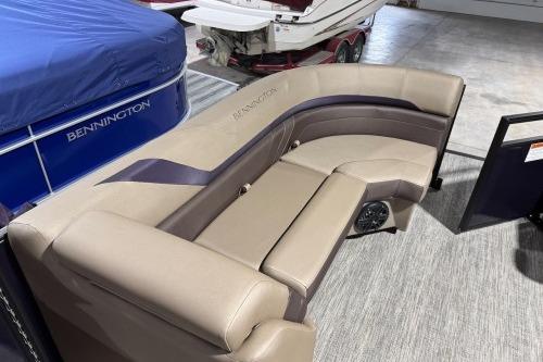 2026 Bennington 22SXSB boat interior with beige and brown seating.