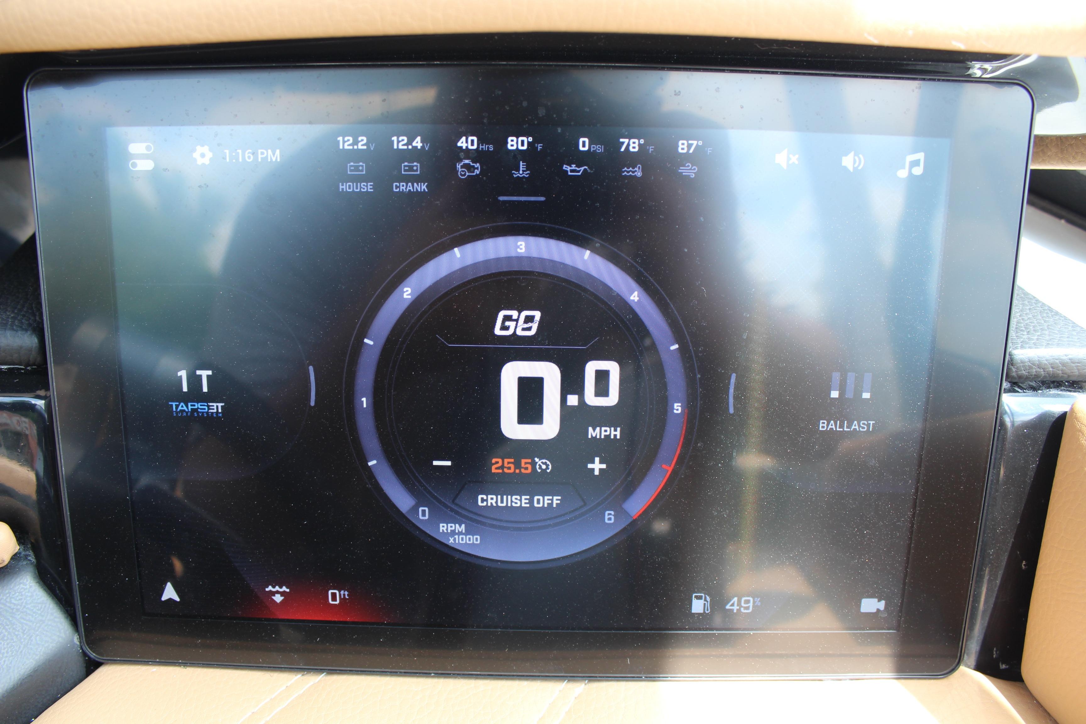 Dashboard display of 2024 Tigé Ultré 25ZX boat showing speed, RPM, and ballast settings.