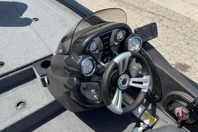 2023 Tracker Pro Team 190 TX Tournament Edition boat dashboard with gauges and steering wheel.