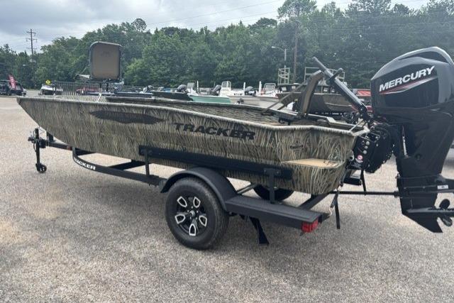 2026 Tracker Grizzly 1650 T Prairie Wings Edition boat with Mercury engine on trailer.