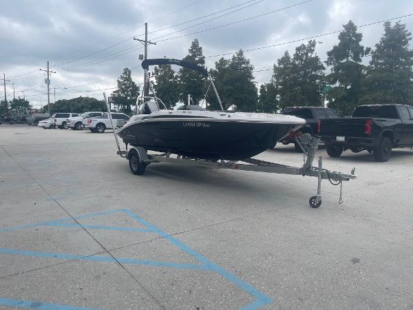 2022 Hurricane SS185 OB boat on a trailer in a parking lot.