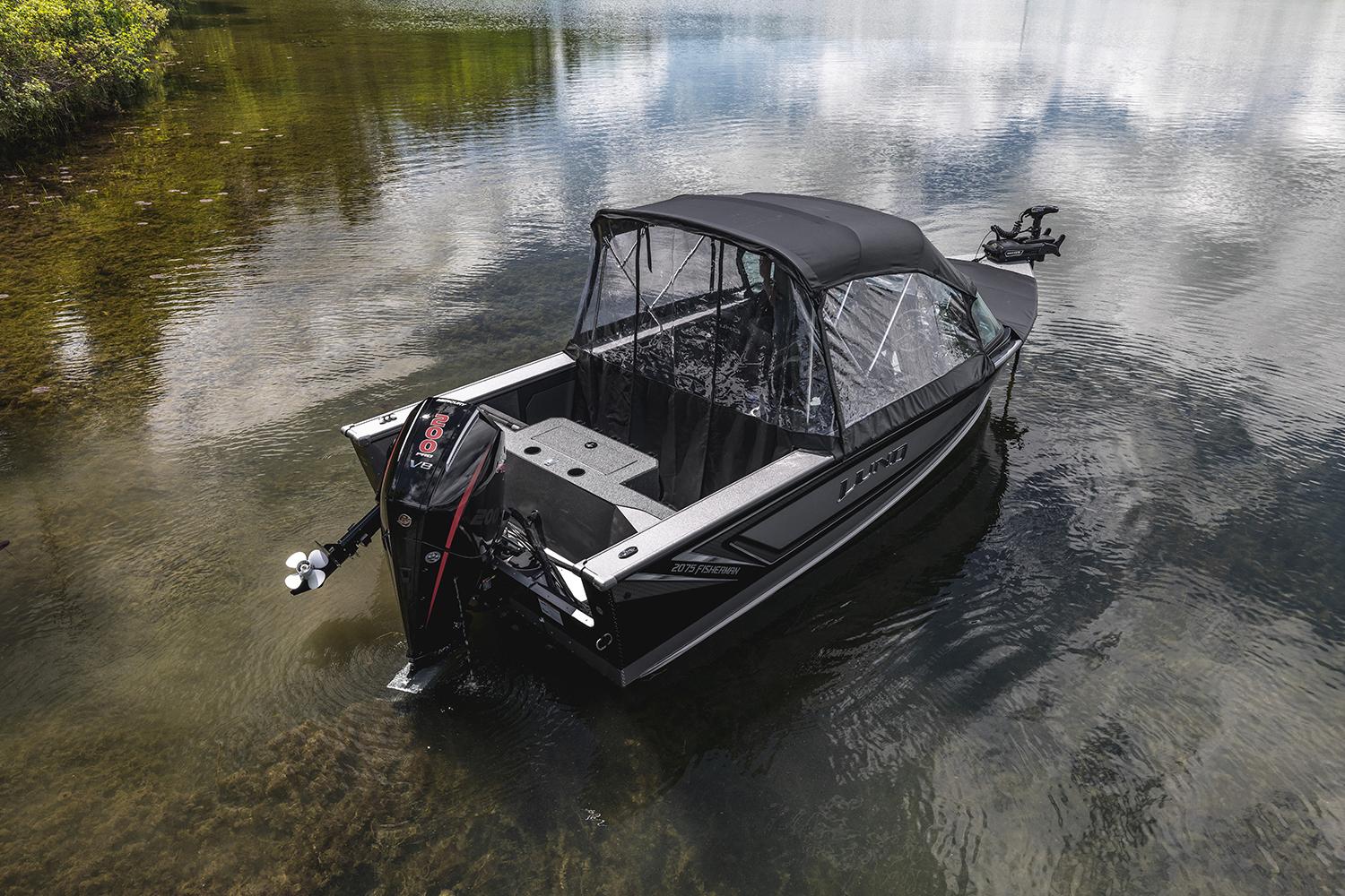 Manufacturer Provided Image: 2025 Lund 2075 Fisherman boat on calm lake water.