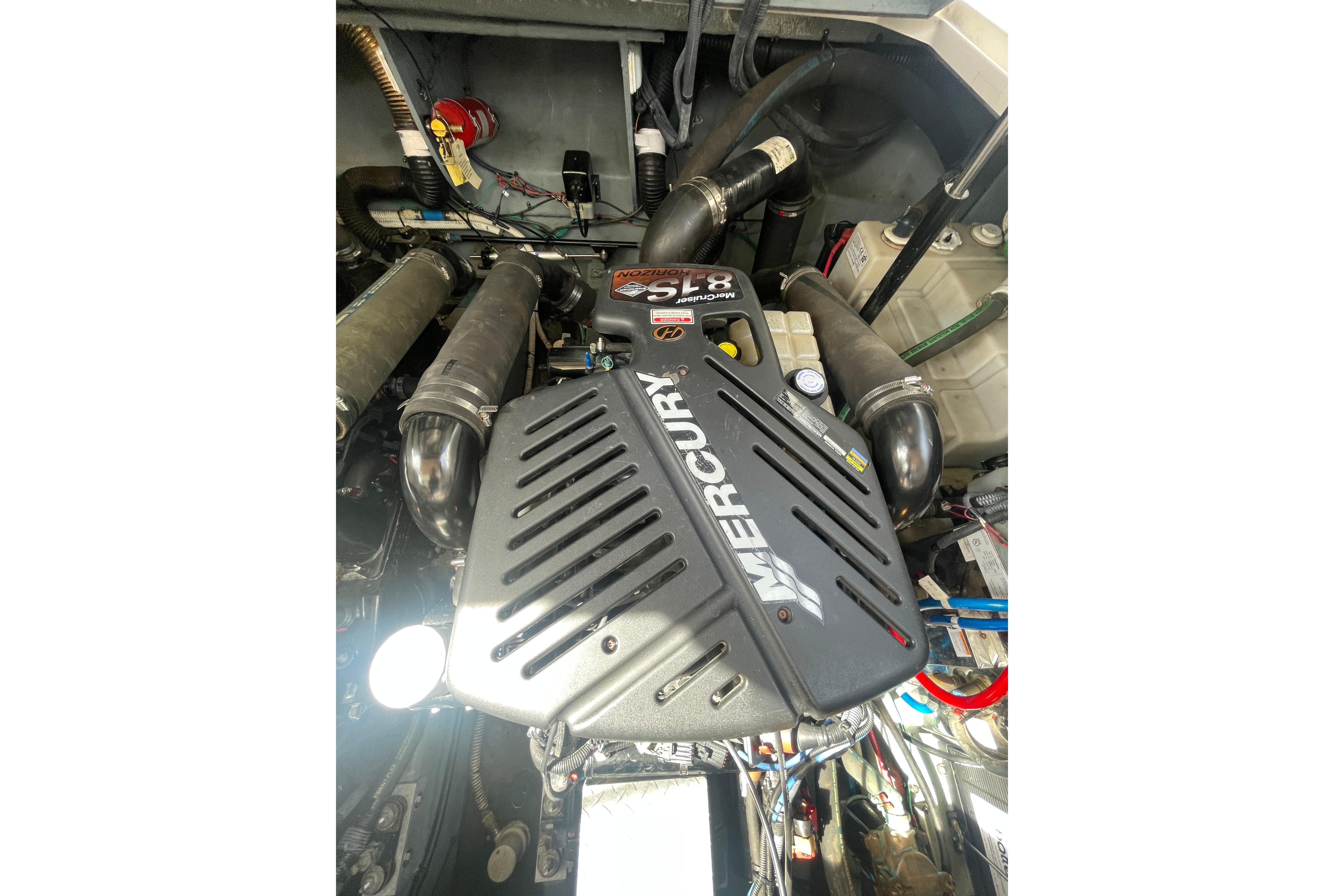 Engine compartment of a 2003 Sea Ray 340 Sundancer with Mercury components.