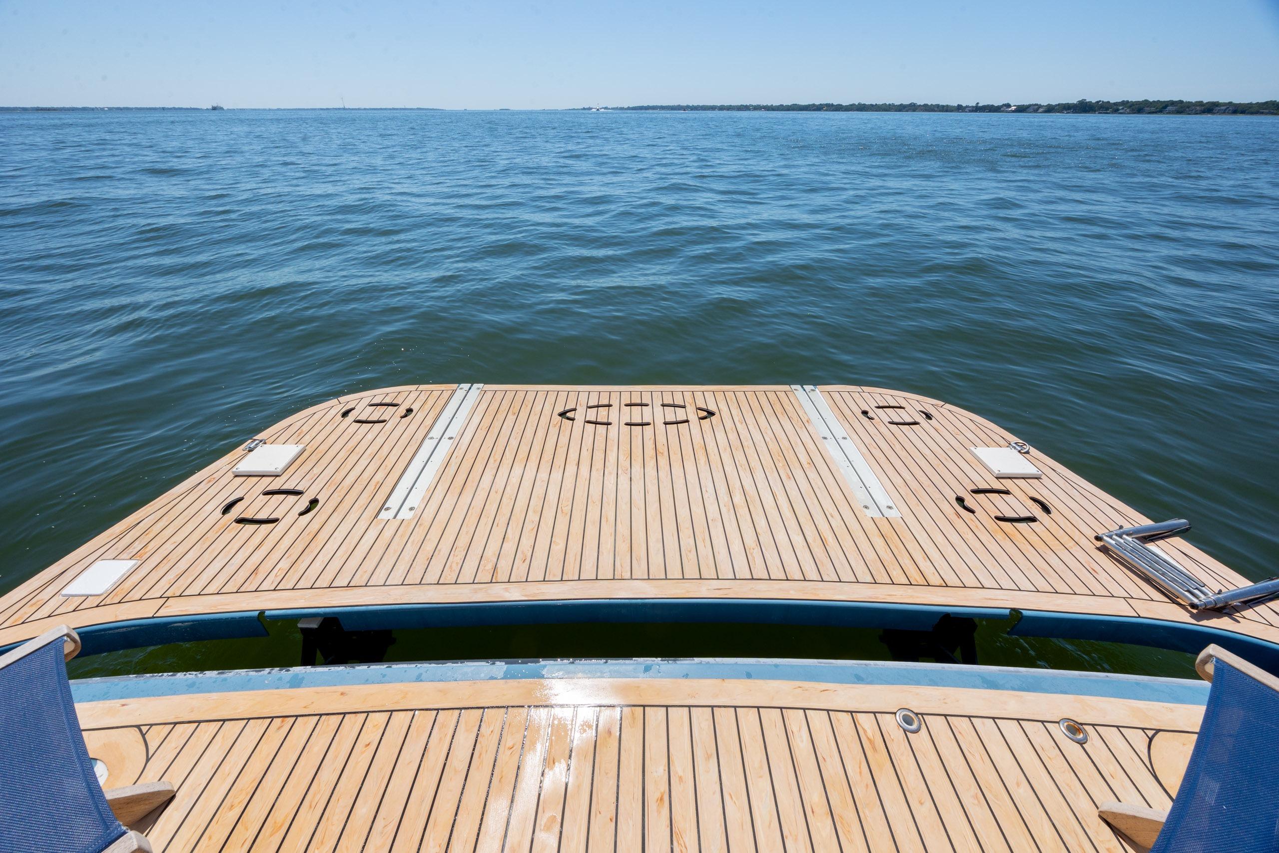 Ocean Alexander 52 Sedan 2005 yacht deck overlooking calm blue waters.