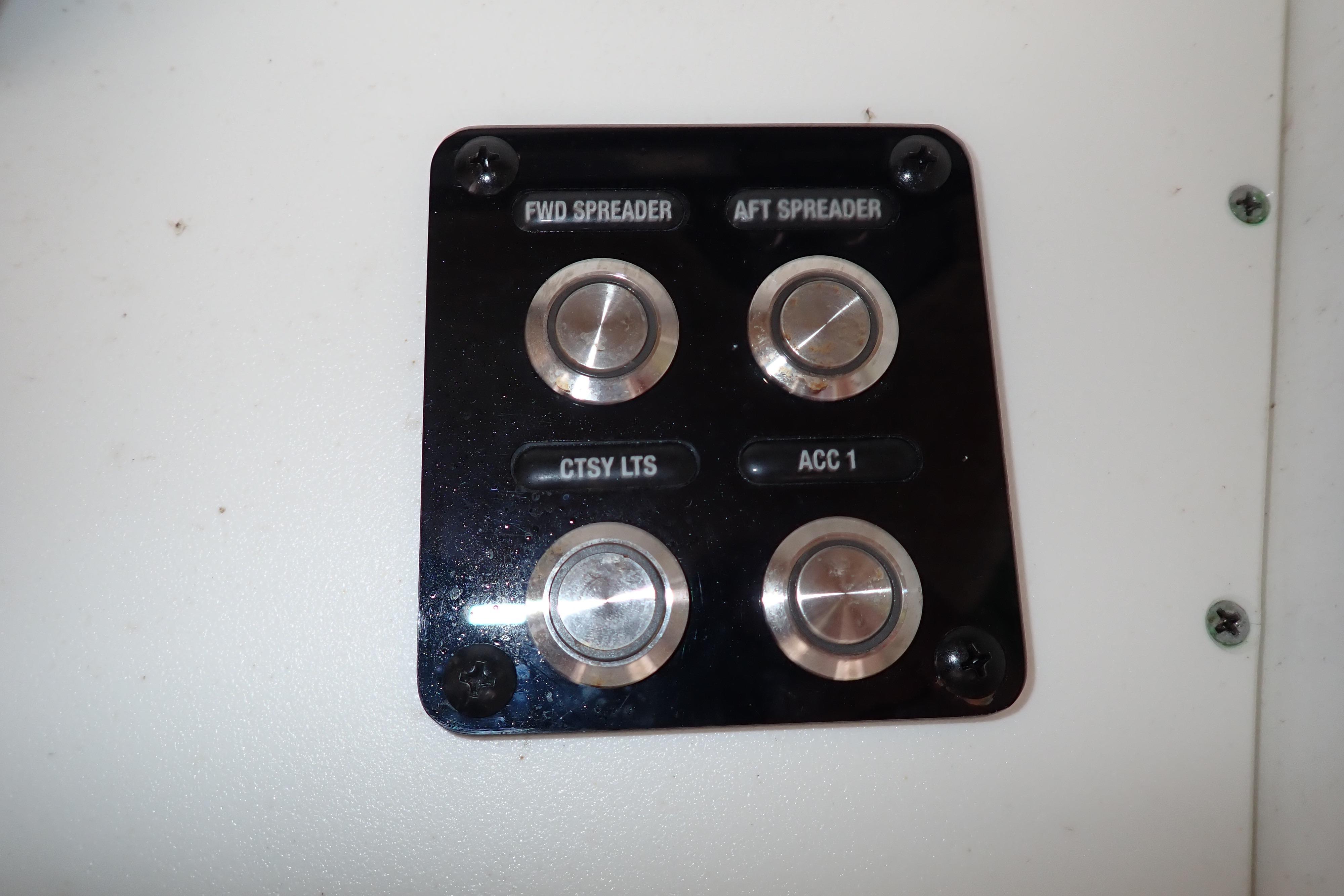 Control panel of a 2019 Key West 263 FS boat with labeled buttons.
