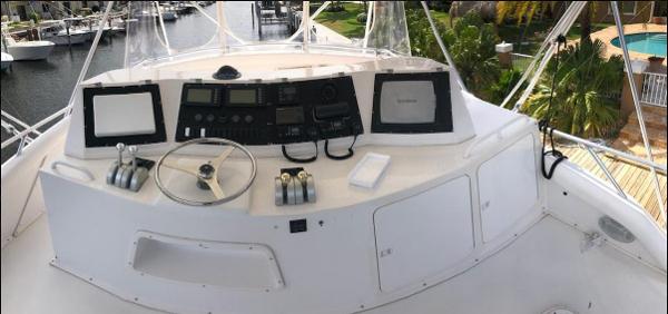 1997 Bertram Convertible yacht helm with navigation equipment and controls.