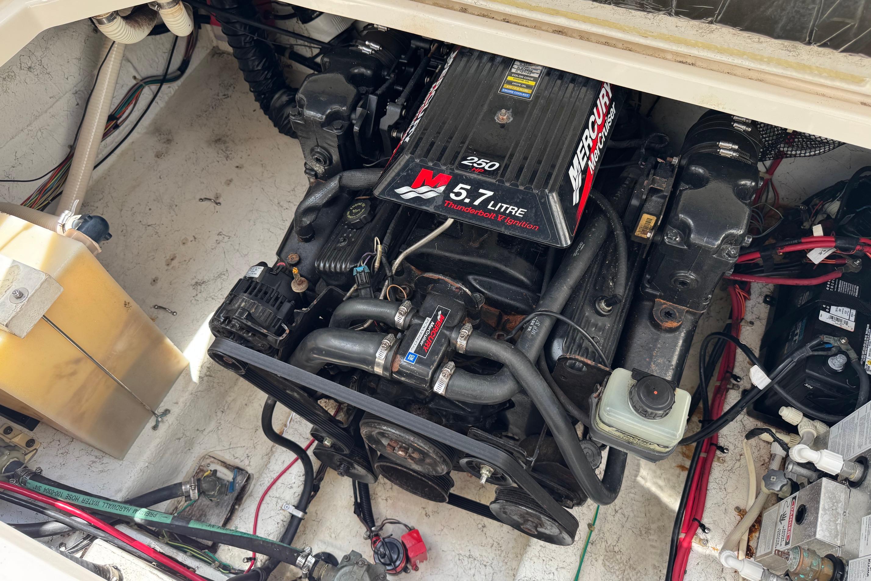 Engine compartment of a 2000 Maxum 2400 SCR with a 5.7-liter Mercury engine.