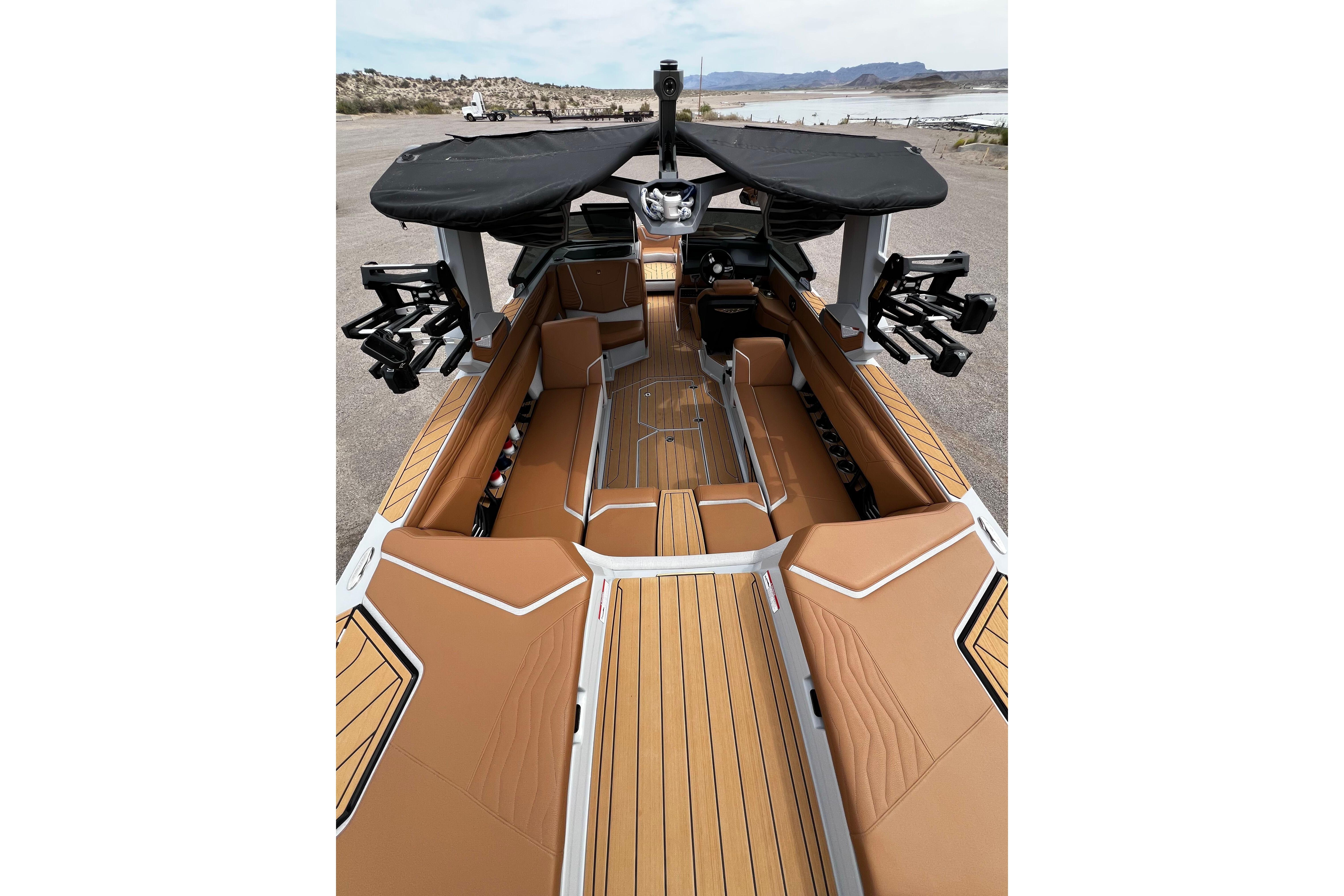 2026 Nautique Super Air Nautique G25 interior with tan seating and sleek design.