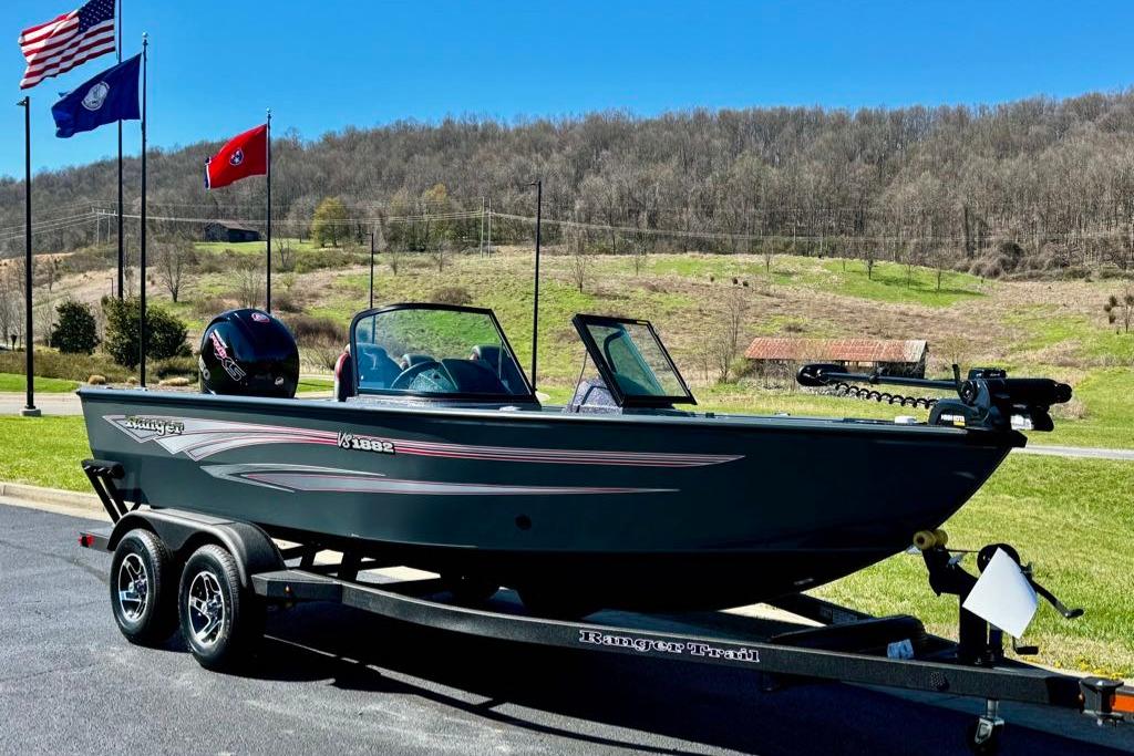 2026 Ranger VS1882SC Reata boat on trailer, parked with scenic background.