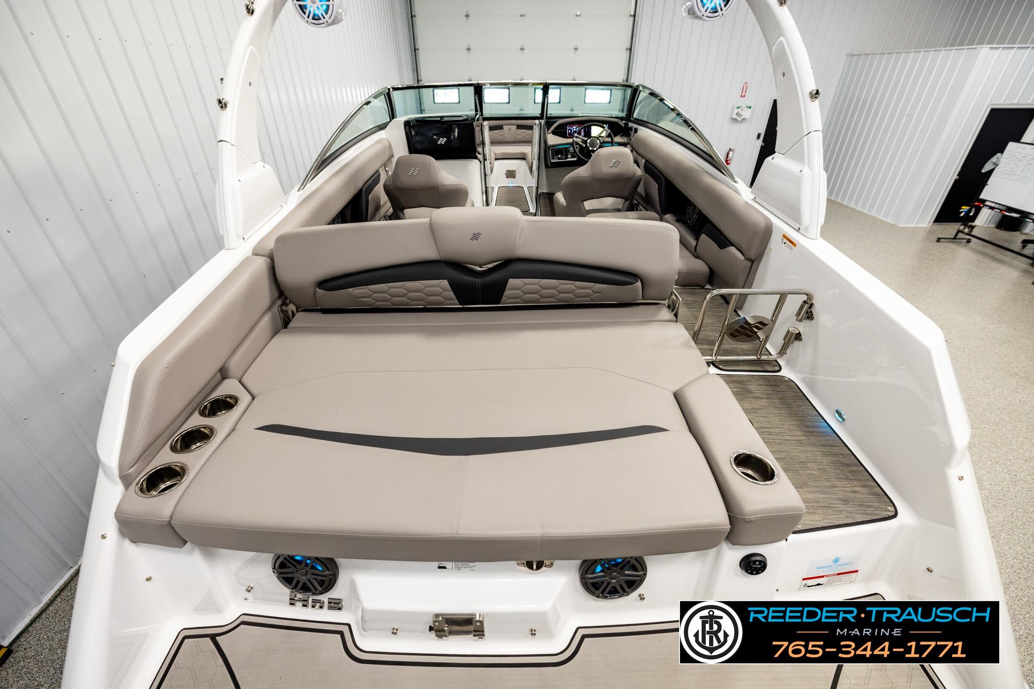 2024 FOURWINNS HD5 Surf boat interior with spacious seating and modern design.