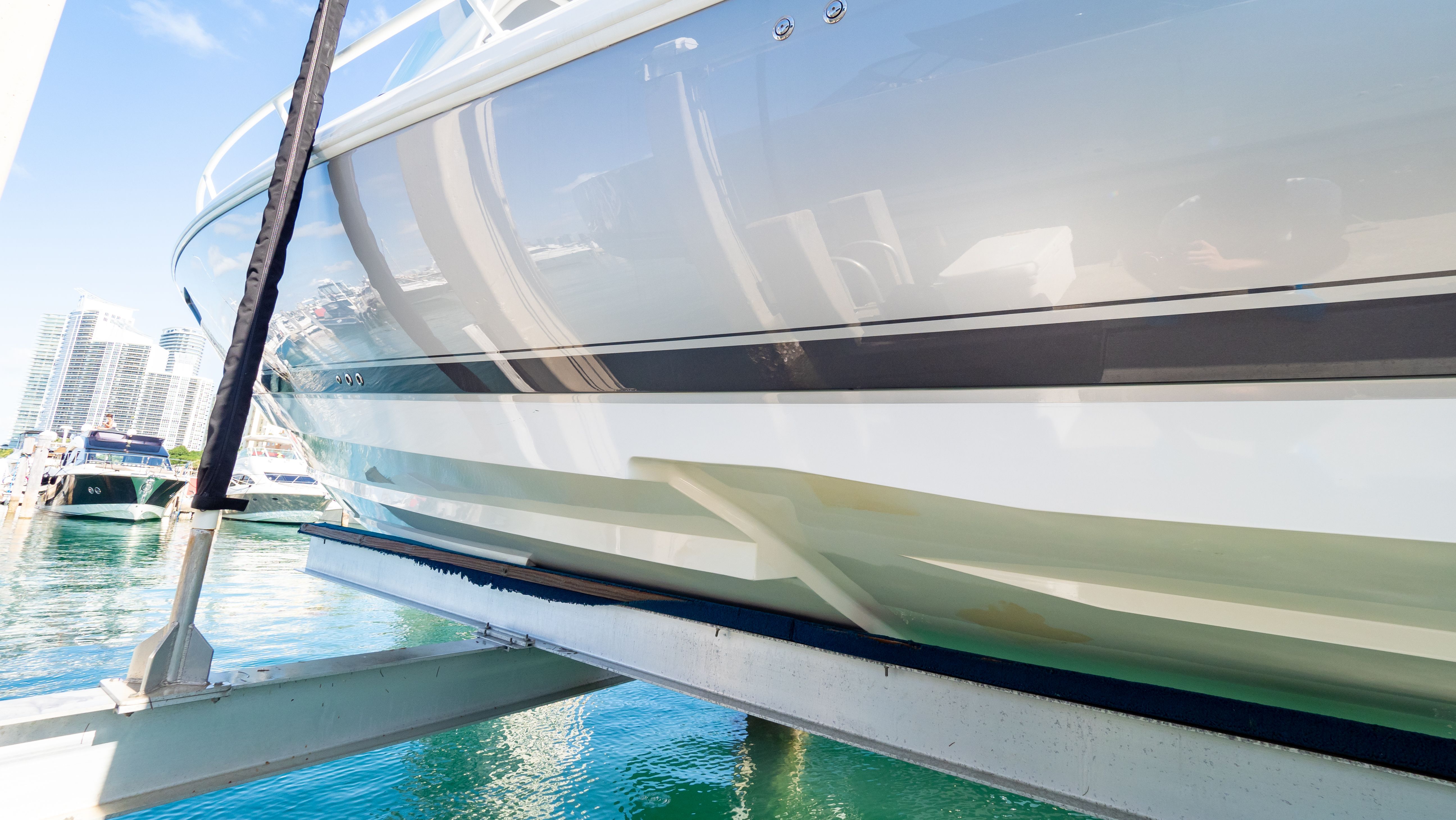 2018 Intrepid 375 boat in harbor, side view.