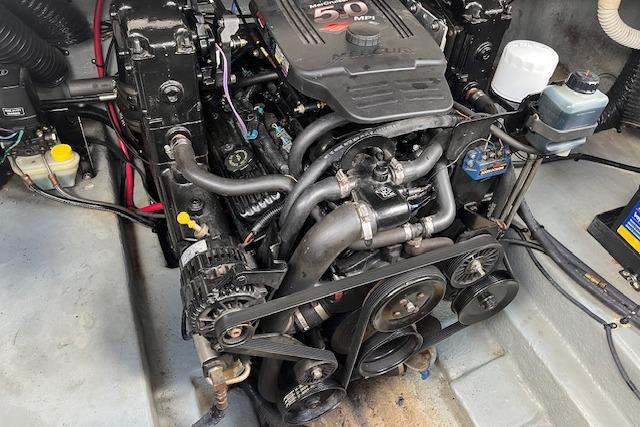 Engine of 2003 Sea Ray 260 Sundancer boat, showcasing mechanical components and layout.
