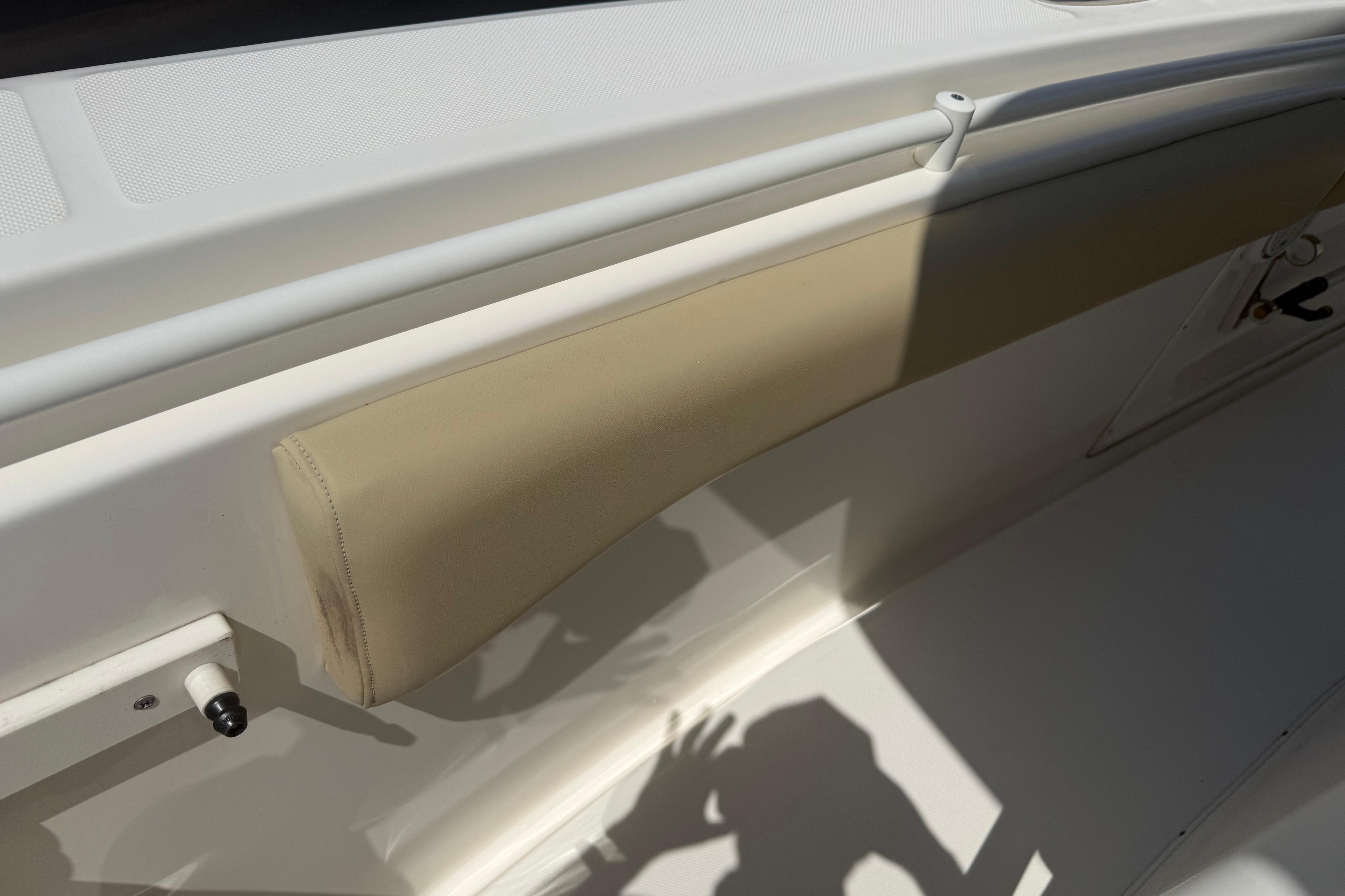 2019 Key West Billistic 281 Center Console interior detail with beige cushioning.