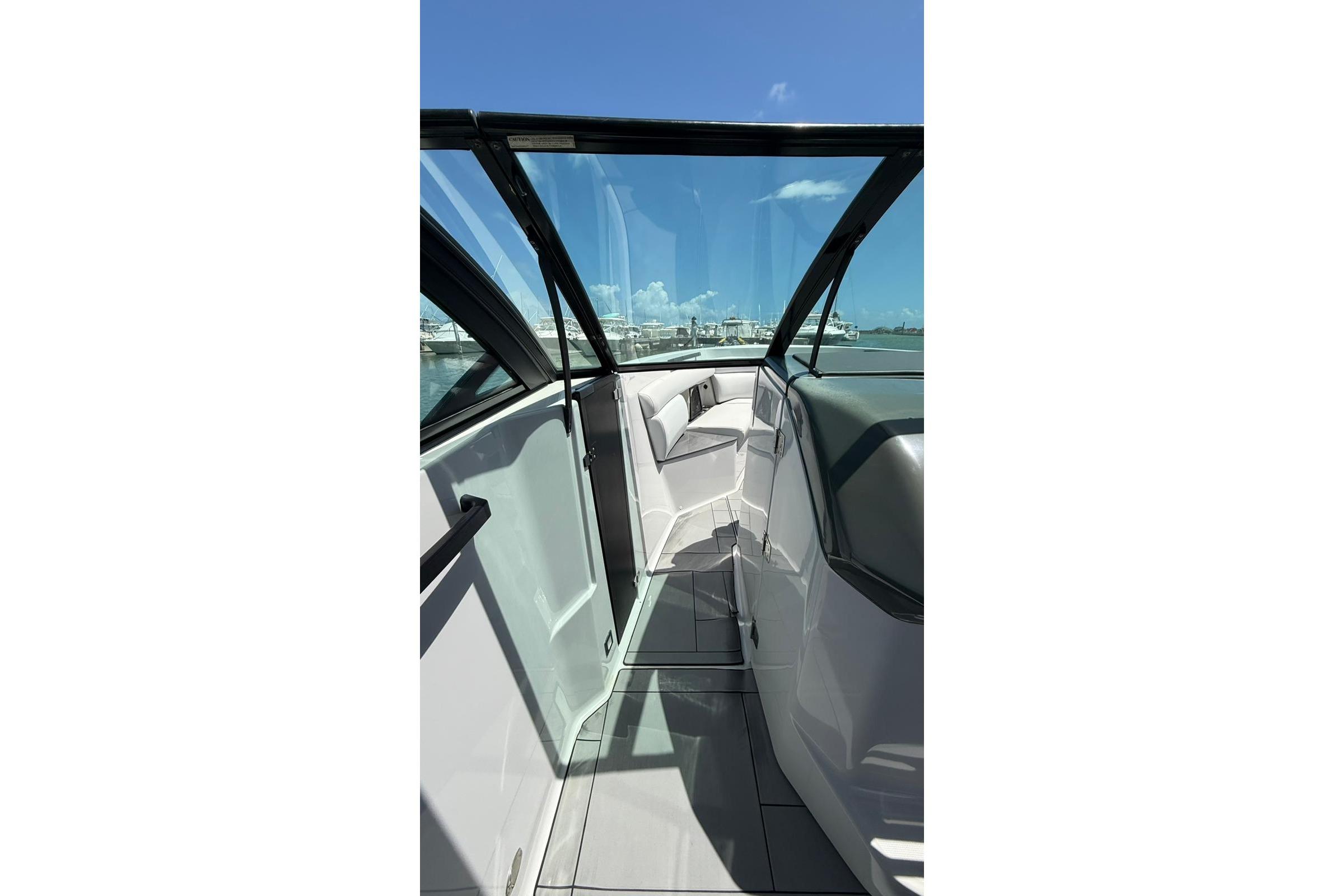 2023 Aviara 32AV boat interior with sleek design and clear glass panels.