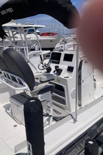 2025 Sea Pro 202 Center Console boat with modern dashboard and seating.