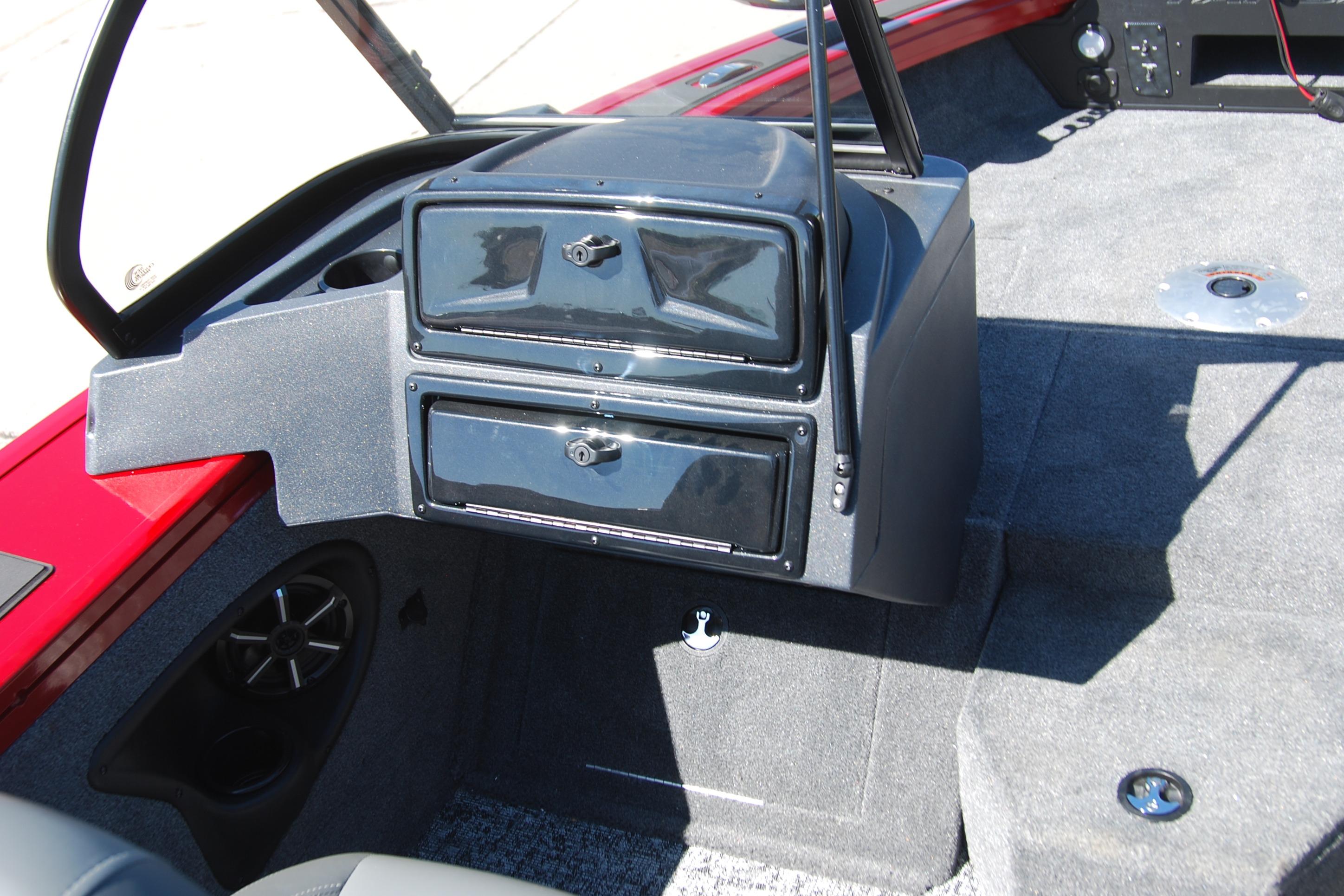 2026 Tracker Targa V-18 WT boat interior with storage compartments and speaker.