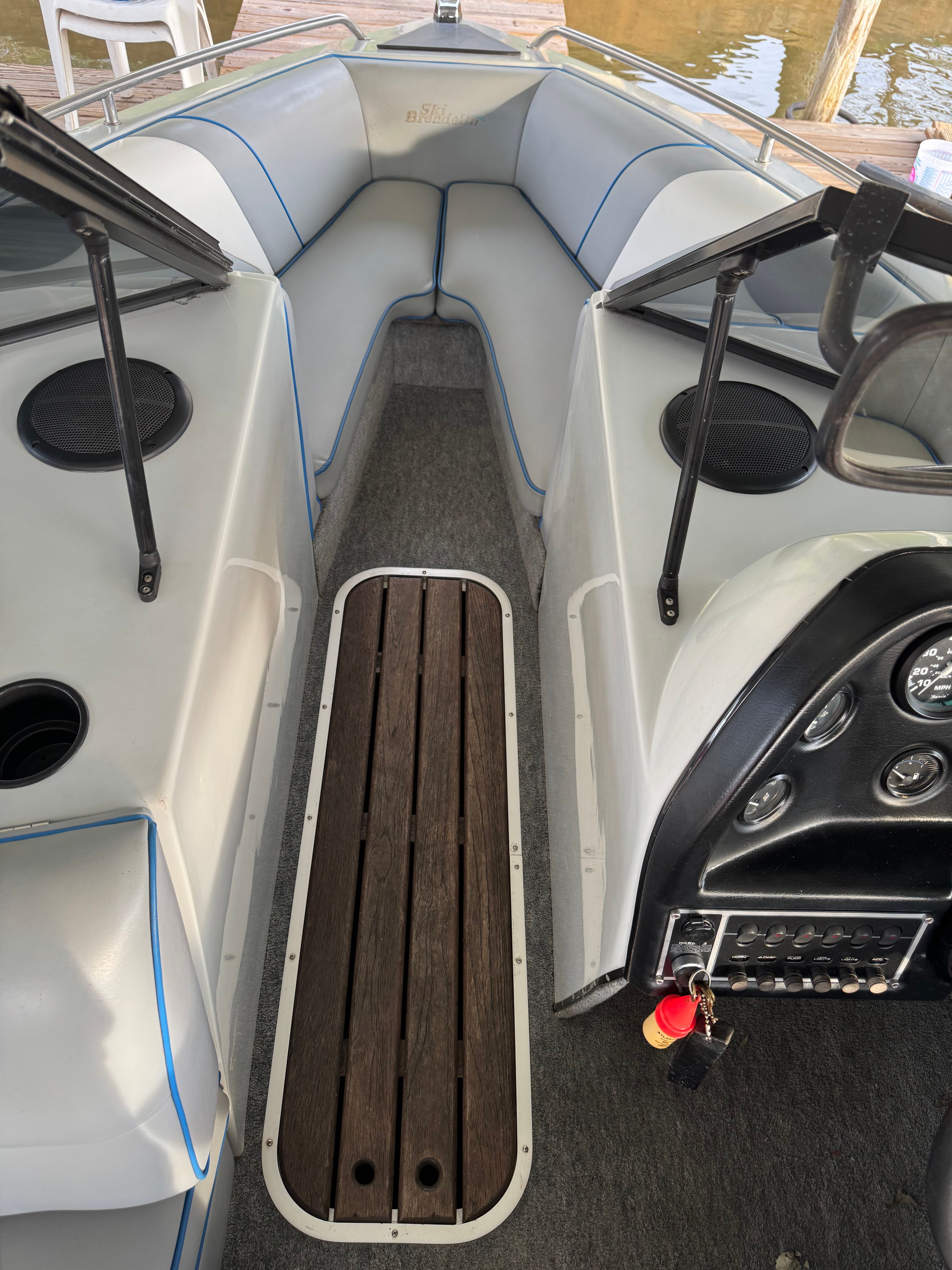 Interior of a 1992 Ski Brendella Spectrum boat with wooden flooring.