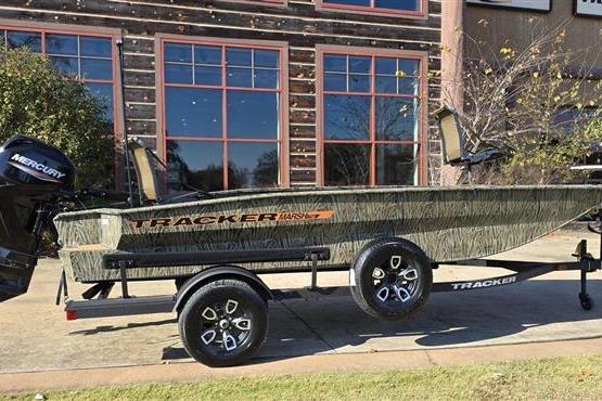 2026 Tracker Grizzly 1756 T Marsh boat on trailer, parked outdoors.