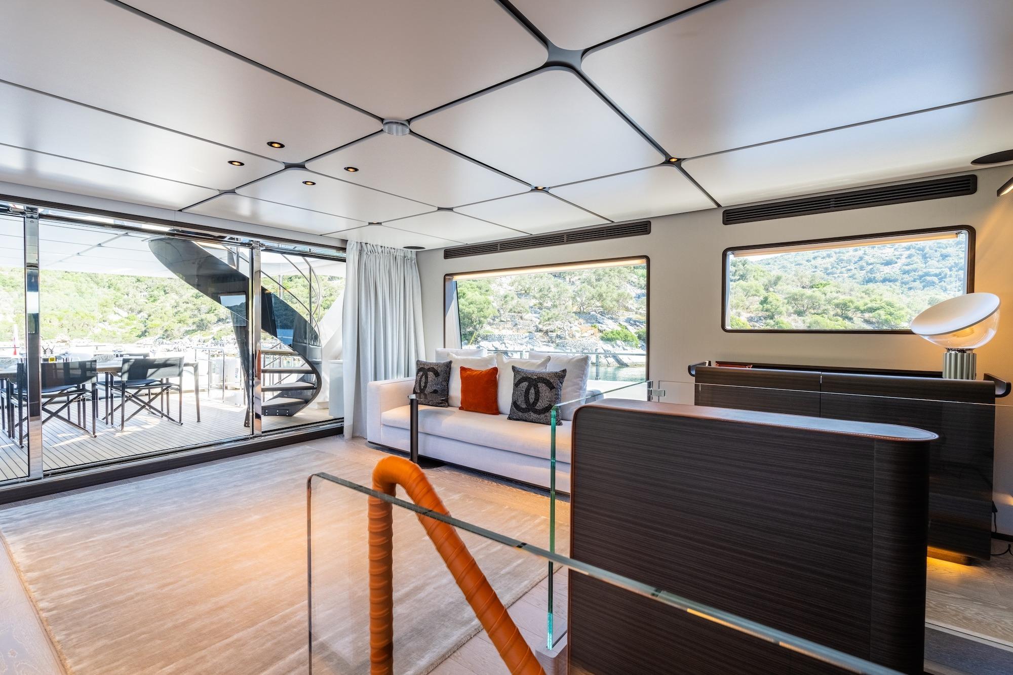 Luxurious interior of 2024 Custom Line Navetta 30 yacht with modern decor and scenic views.