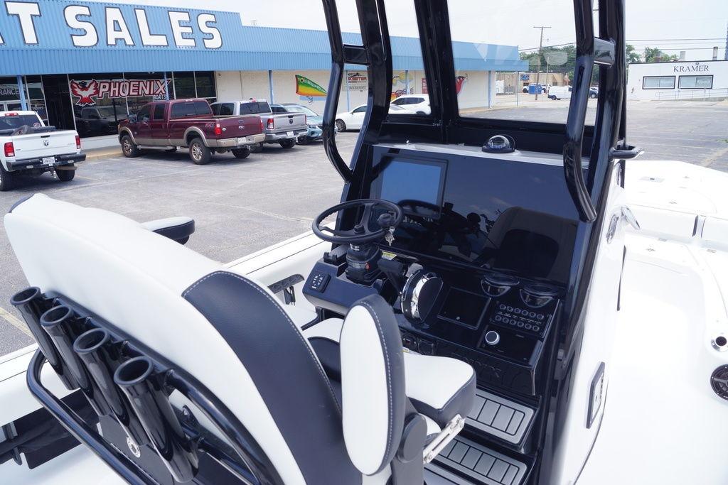 2027 Tidewater 2500 Carolina Bay boat interior with modern console at dealership.