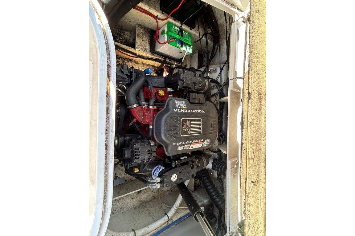 Engine compartment of a 2006 Four Winns 244 Funship with Volvo Penta engine.