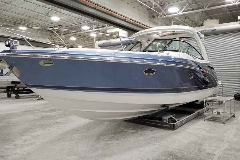 2021 Formula 350 Sun Sport boat in indoor storage facility.