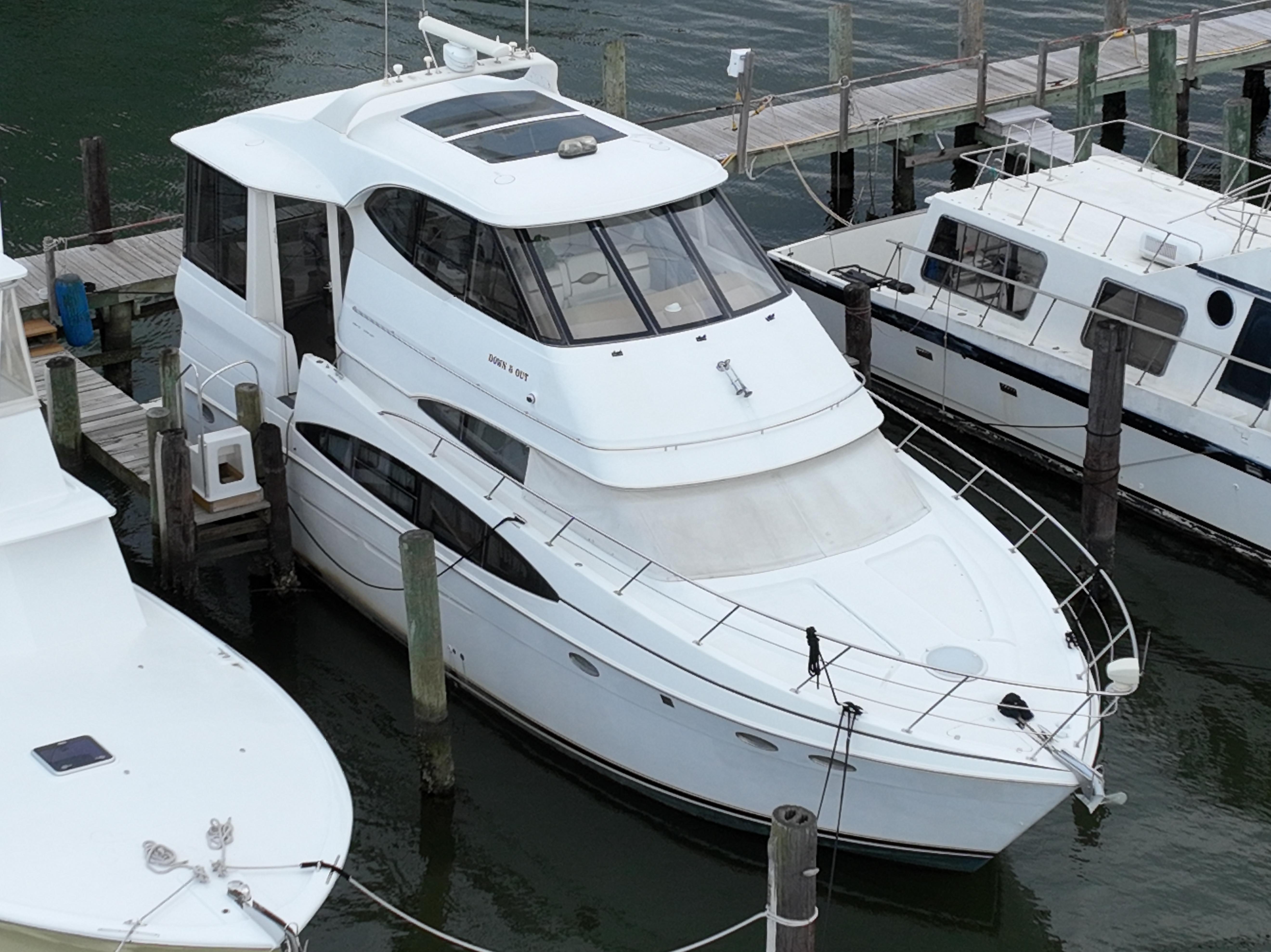 2000 Carver 506 Motor Yacht docked at marina, aerial view.