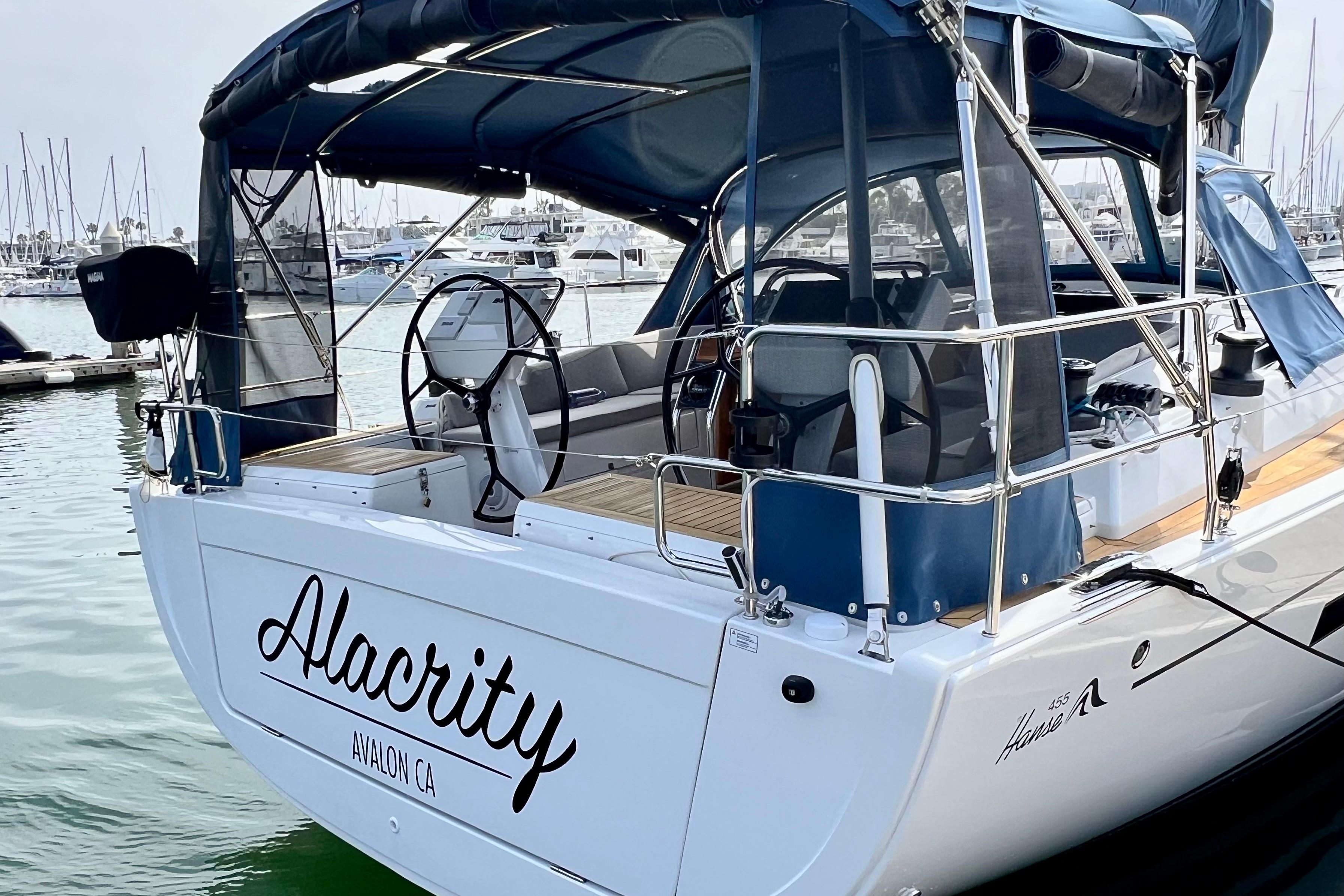 Sailing yacht Hanse 455, 2016 model, docked at marina with "Alacrity" name.