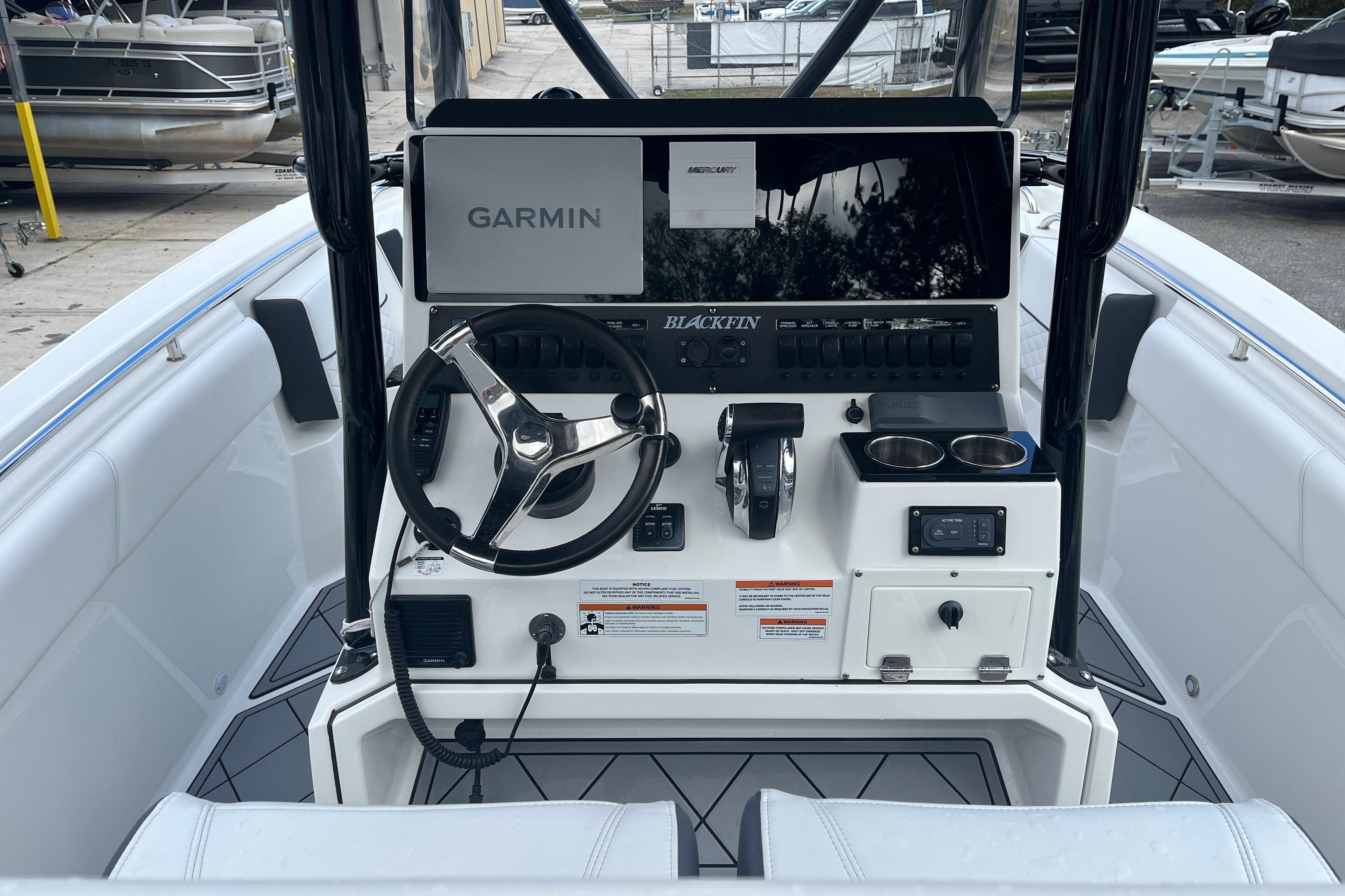 2021 Blackfin 252 CC boat console with Garmin navigation system and modern controls.