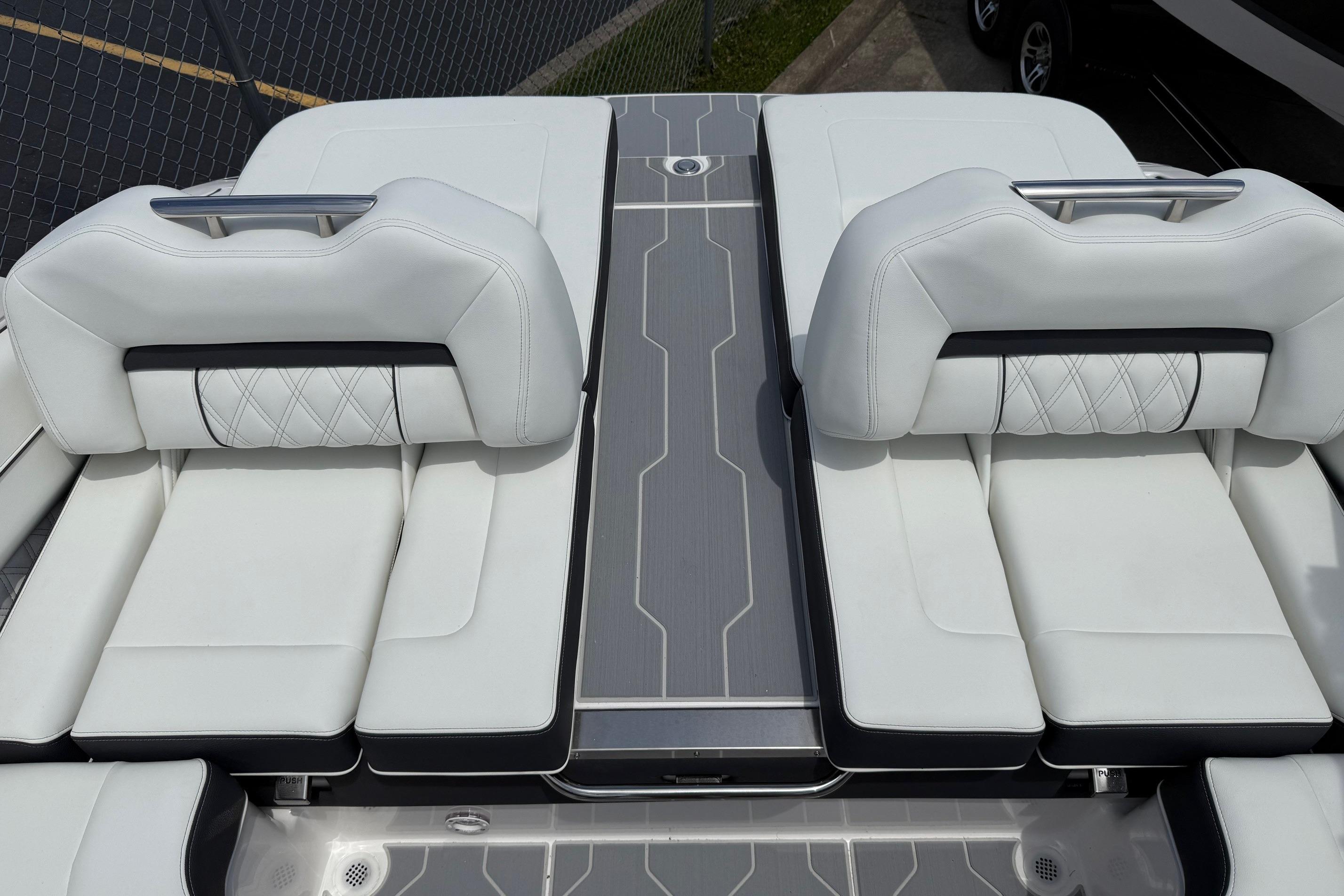 2026 Regal LS4 Surf boat with luxurious white seating and modern design.