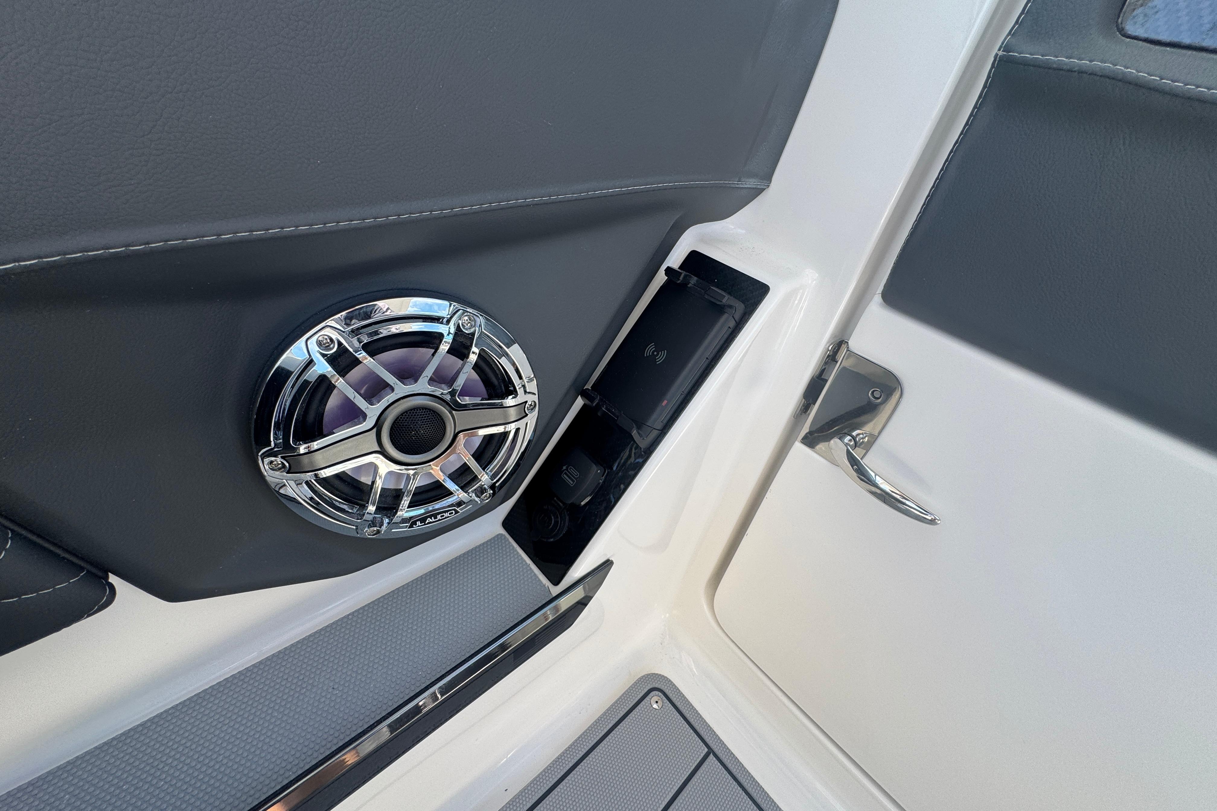 2026 Chaparral SSX 30 boat interior with speaker and charging port detail.