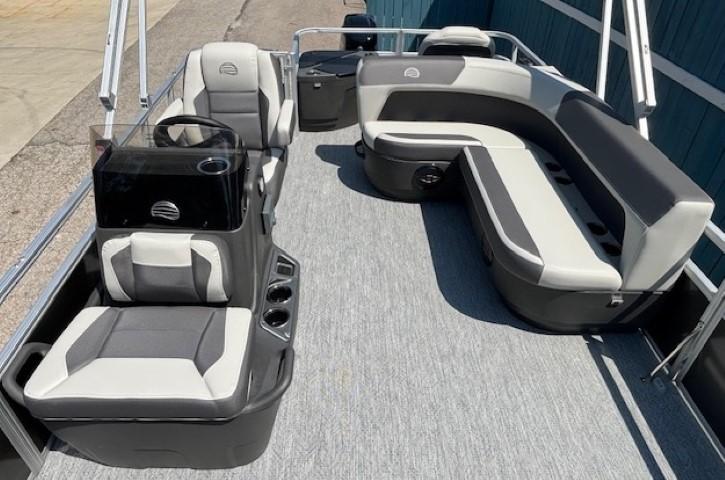 2026 Sun Tracker Bass Buggy 18 DLX pontoon boat with spacious seating and modern design.