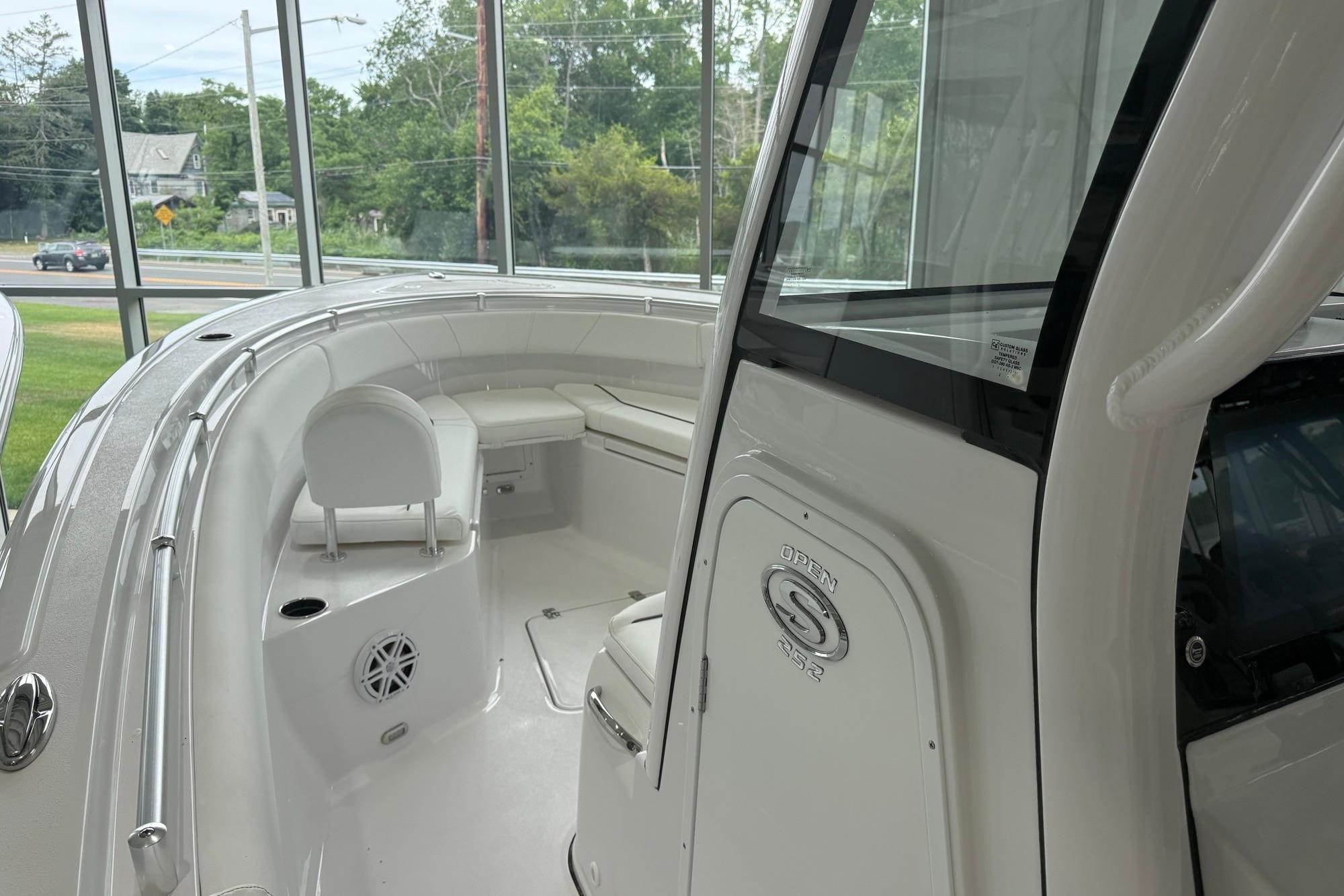 2026 Sportsman Open 252 Center Console boat interior with seating and console details.