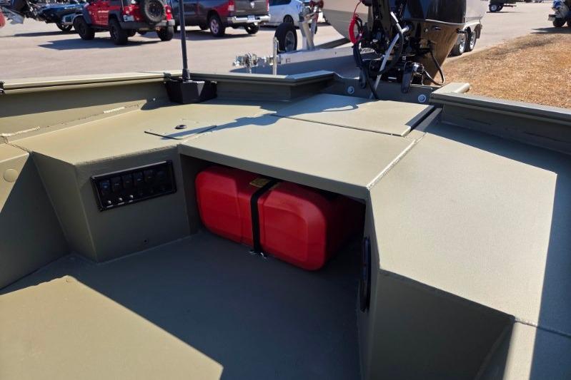 2026 Tracker Grizzly 1650 T Prairie Wings Edition boat interior with red fuel tank.